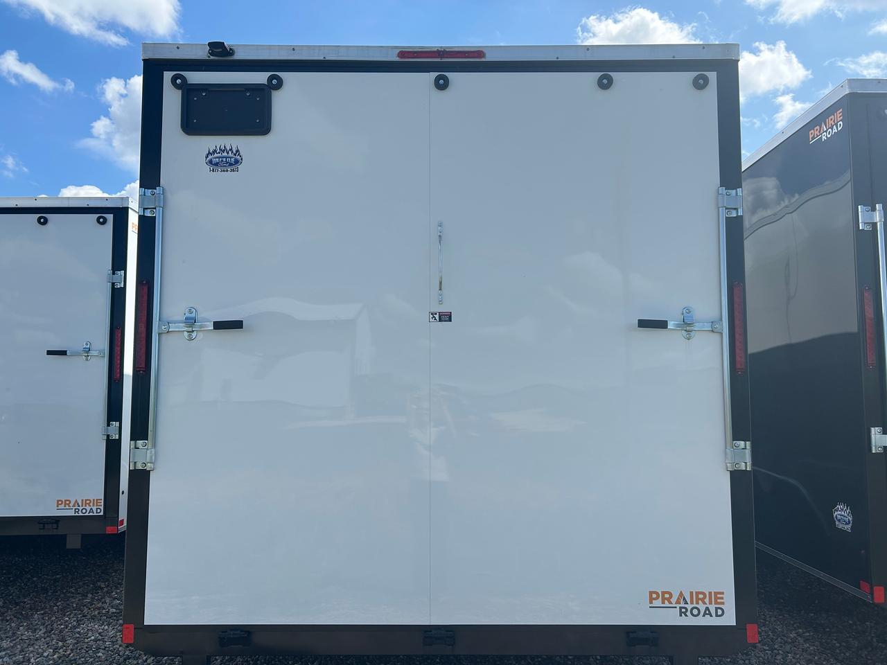2026 Prairie Road Enclosed Cargo 8.5' x 24' Prairie Road Ramp Door Photo5