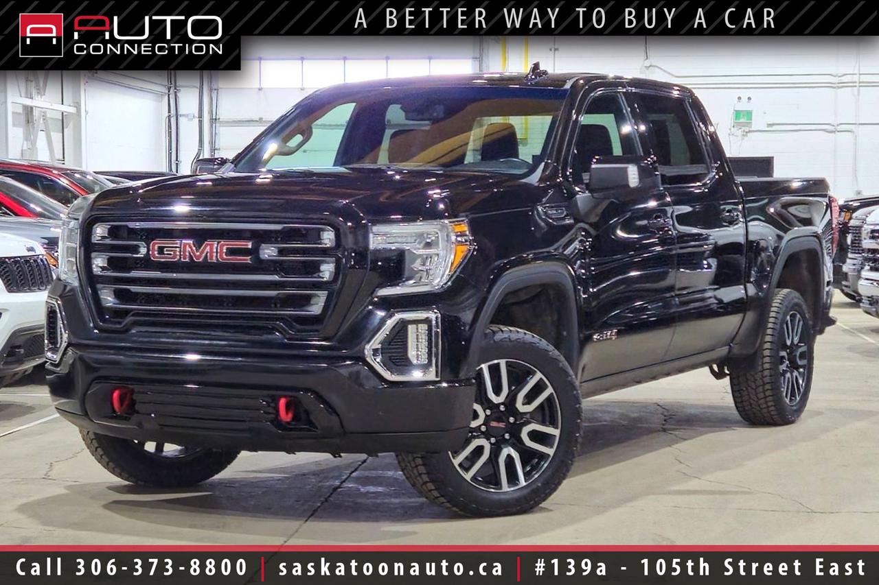 <p><span></span><font color=#000000><span><span>Financing & Warranty Available!</span><span><br></span></span></font><span><br></span><span>Crew Cab w/ 5.8ft. Box - Accident Free - SK Truck</span><span><br></span><span><br>Purpose-built for drivers who demand real capability without sacrificing refinement, this accident-free <b>2022 GMC Sierra 1500 AT4 Crew Cab</b> stands out in striking Ebony Twilight Metallic and is proudly local to Saskatchewan. Available now at Saskatoon Auto Connection, it is powered by the proven 5.3L EcoTec3 V8 paired to a smooth 10-speed automatic, delivering confident acceleration and serious towing strength. The factory-installed 2-inch suspension lift, advanced 4x4 system, and Traction Select System give this AT4 the stance and control to handle everything from job sites to backcountry trails. When it is time to hook up, the trailering package and integrated brake controller make hauling seamless and secure. Inside, the cabin is a true upgrade, finished in Jet Black perforated leather with distinctive Kalahari accents that set the AT4 apart from the ordinary. Cooled and heated front seats, heated rear seats, a heated steering wheel, and memory settings create a premium environment built for Saskatchewans changing seasons. The intuitive 8-inch touchscreen with navigation, Apple CarPlay, and Android Auto keeps you connected and confidently on course wherever the road leads. With signature LED lighting, the versatile Multi-Pro tailgate, and a spray-on bedliner ready for work, this Sierra AT4 delivers the perfect balance of rugged performance and upscale comfort in one commanding package.<br><br></span><b>Key Features:</b><span><br></span><span><br>- 4x4<br>- Cooled & Heated Front Seats<br>- Heated Rear Seats<br>- Heated Steering Wheel<br>- Remote Start<br>- Apple CarPlay & Android Auto Compatibility<br>- Navigation<br>- Rear Vision Camera<br>- 8-Inch Touchscreen Display<br>- Drivers Seat Memory Settings<br>- Power-Folding Heated Side Mirrors<br>- LED Headlamps & Fog Lamps<br>- LED Taillamps<br>- GMC Multi-Pro Six-Function Tailgate<br>- Spray-On Bedliner<br>- Traction Select System<br>- Trailering Package<br>- Integrated Trailer Brake Controller<br>- 9,200lb. Towing Capacity<br>- Factory-Installed 2-Inch Suspension Lift<br>- 10-Speed Automatic Transmission<br>- 5.3L EcoTec3 8-Cylinder Engine<br><br><b>Exterior Colour:</b> Ebony Twilight Metallic<br><b>Interior Colour:</b> Jet Black Perforated Leather w/ Kalahari Accents<br><br><b>Vehicle Specifications:</b> </span><a href=https://www.autotrader.ca/research/gmc/sierra%201500/2021/?srsltid=AfmBOoq_G0AxrUnXGbk1FXvHRs6D_ag7Xe2y-xnE-chucKUrvf9_jHze target=_blank><span>https://www.autotrader.ca/research/gmc/sierra%201500/2021/?srsltid=AfmBOoq_G0AxrUnXGbk1FXvHRs6D_ag7Xe2y-xnE-chucKUrvf9_jHze</span></a><span><br><br></span><span>Unlock a full year of exclusive VIP benefits with your purchase! Enjoy 20% off labour, 25% off tires, free windshield stone chip repairs, and so much more. Visit saskatoonauto.ca for all the details.<br></span><span><br>Honesty Pricing eliminates the haggle hassle by providing you with our lowest possible selling price up front. In fact, it is the lowest price in our market, and we will prove it by disclosing a comprehensive market report of what our competitors are selling similar vehicles for.<br></span><span><br>This vehicle meets our Diamond Certification standard, which begins by selecting only premium quality vehicles and subjecting them to a much more comprehensive inspection process than typical dealerships use. Diamond Certified ensures a clean history, exceptional appearance and problem-free operation.<br></span><span><br>At Saskatoon Auto Connection we sell pre-owned automobiles the way we would like to buy them ourselves. Since 2008, we have been dedicated to providing the highest level of integrity and transparency in our industry, in combination with the highest quality vehicles at the most competitive prices in Saskatchewan. Our friendly staff is ready to positively redefine your expectations of the pre-owned automobile space.</span><span></span></p>