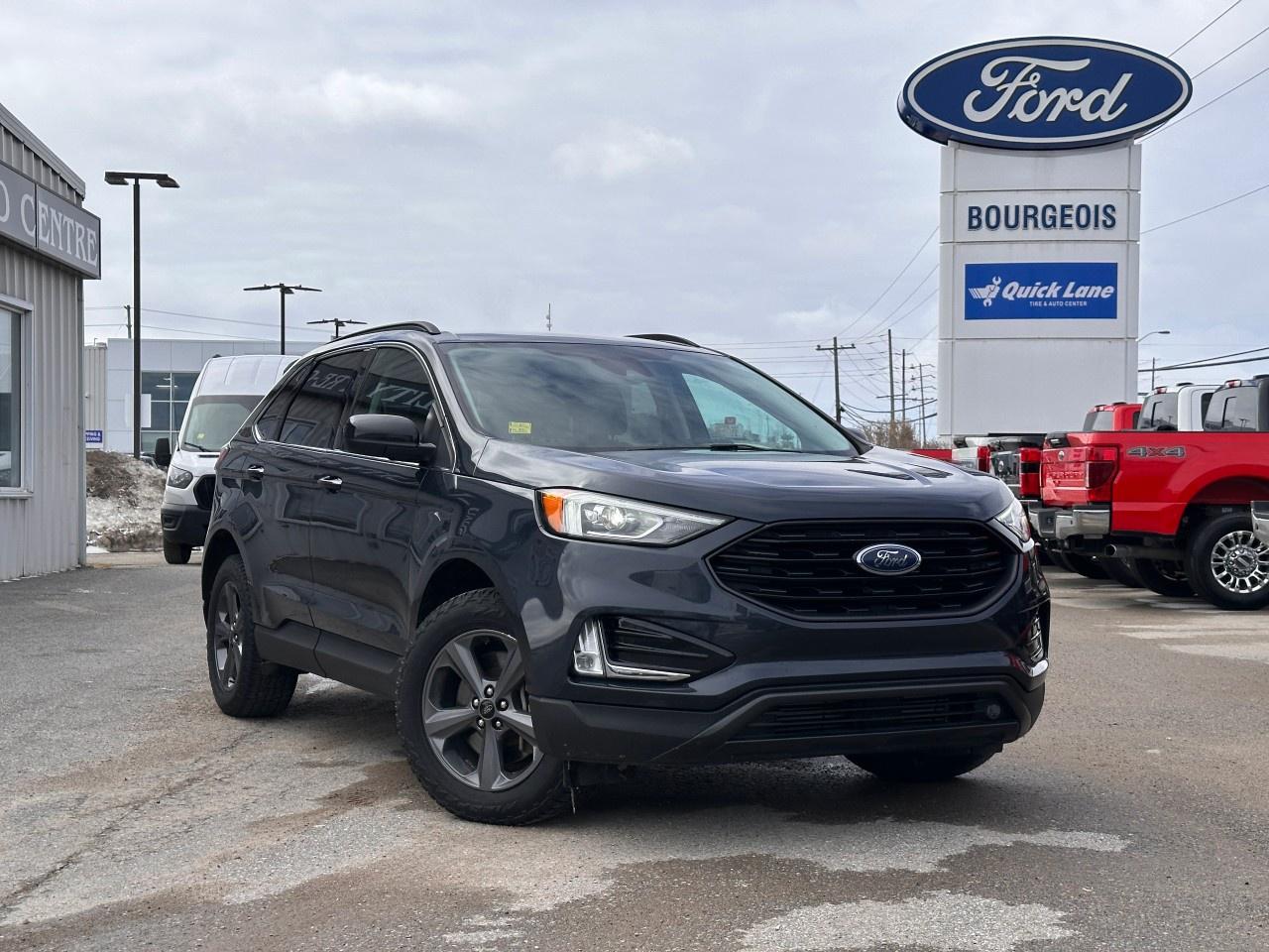 <p>The 2022 Ford Edge SEL AWD in an eye-catching Blue is the perfect match for drivers seeking comfort and capability in all weather conditions. With its All-Wheel Drive, this SUV offers stable handling and confidence behind the wheel regardless of the terrain.</p><p>The exterior of the Ford Edge SEL showcases sporty alloy wheels and heated mirrors, providing a touch of elegance and practicality. Step inside to a harmonious Blue interior that elevates your driving experience with its thoughtful design. Enjoy the comfort of heated front seats and a leather-wrapped steering wheel, making every journey a pleasurable one.</p><p>Packed with advanced technology, the Edge features a user-friendly touchscreen interface offering satellite radio and smart device integration, keeping you connected on the go. Safety is made a priority with options such as a backup camera and lane assist, along with parking sensors for those tight urban spots.</p><p>This SUV is ideal for individuals or families who value versatility, style, and innovative features. Make the Ford Edge SEL your trusted companion and take the next step to arrange a test drive today. Contact our dealership for more information and see how the Edge can cater to your driving needs.</p>