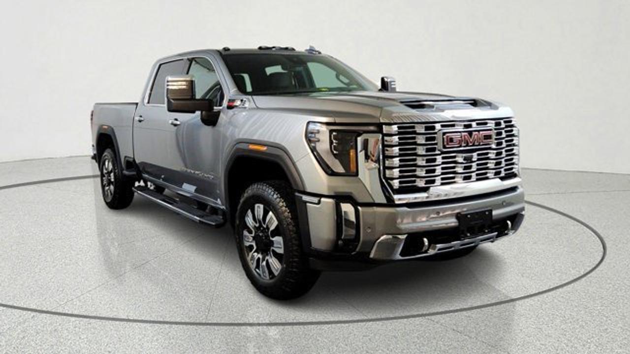 The 2026 GMC Sierra 2500HD Denali is a heavy-duty pickup that combines serious towing and hauling capability with upscale comfort and technology. Its equipped with a powerful Duramax 6.6-liter turbo-diesel V8 engine producing up to 470 hp and 975 lb-ft of torque, paired with a 10-speed automatic transmission. It offers advanced trailer-assist technologies and a six-function MultiPro tailgate. Inside, the Denali trim features premium materials, a large 13.4-inch touchscreen with Google built-in, a digital driver display, luxurious leather-trimmed seating with available massage functions, and a suite of advanced safety and connectivity features. This model comes ready to work witha gooseneck / 5th wheel prep kit, universal vehicle module and an upfitter switch kit. Theres also a power sunroof to take it all in.