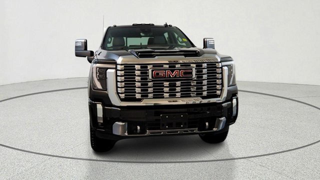 The 2026 GMC Sierra 2500HD Denali is a heavy-duty pickup that combines serious towing and hauling capability with upscale comfort and technology. Its equipped with a powerful Duramax 6.6-liter turbo-diesel V8 engine producing up to 470 hp and 975 lb-ft of torque, paired with a 10-speed automatic transmission. It offers advanced trailer-assist technologies and a six-function MultiPro tailgate. Inside, the Denali trim features premium materials, a large 13.4-inch touchscreen with Google built-in, a digital driver display, luxurious leather-trimmed seating with available massage functions, and a suite of advanced safety and connectivity features. This model comes ready to work witha gooseneck / 5th wheel prep kit, universal vehicle module and an upfitter switch kit. Theres also a power sunroof to take it all in.