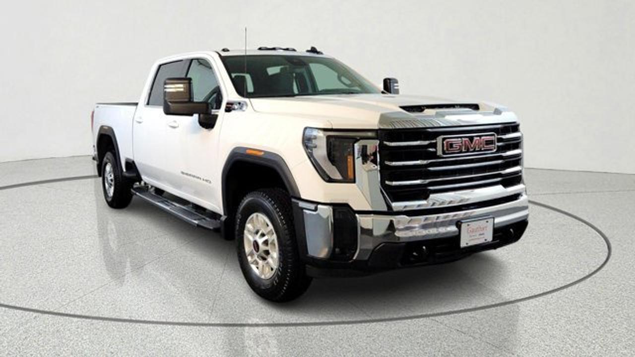 The 2026 GMC Sierra 2500HD SLE is a heavy-duty pickup built for strong towing capability, advanced technology, and everyday work durability. It comes with a 6.6-liter V8 gasoline engine producing about 401 horsepower and 464 lb-ft of torque, paired with an Allison 10-speed automatic transmission and four-wheel drive. Key features include a large touchscreen infotainment system with wireless Apple CarPlay and Android Auto, the MultiPro tailgate and trailering technologies, and driver-assist features such as lane-departure warning, automatic emergency braking, and rear cross-traffic alert. This model also includes a gooseneck/5th wheel prep kit and teh X31 offroad package.