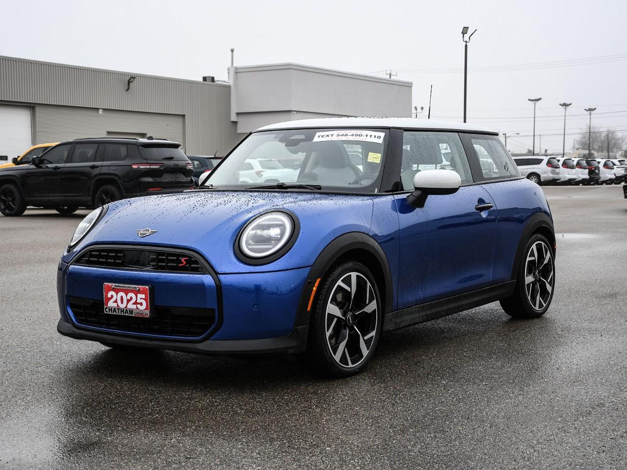 Meet Oliver.<br /><br />A 2025 MINI Cooper S in Blazing Blue, with just 15,329 km and a personality thats as energetic as it is refined, built for drivers who like to have a little fun every time they get behind the wheel.<br /><br />Oliver is the kind of vehicle that turns even the shortest drive into something worth looking forward to. Quick, playful, and full of character, he thrives in the city but never backs down from an open road. With his compact size and sporty attitude, he makes everything feel just a bit more exciting.<br /><br />Under the hood, his 2.0L TwinPower Turbo engine paired with a 7-speed double-clutch transmission delivers sharp, responsive performance. Light on his feet and incredibly agile, Oliver is all about precision and funwithout sacrificing everyday comfort.<br /><br />With the Premier and Comfort Packages, he brings a premium feel to every drive:<br /> Heated front seats & heated steering wheel<br /> Dual-zone automatic climate control<br /> Comfort Access (keyless entry)<br /> Power moonroof<br /> Auto-dimming mirrors with folding function<br /> 18''' Slide Spoke 2-tone alloy wheels<br /><br />Inside, Oliver keeps things modern, sporty, and connected:<br /> Heads-up display<br /> Wireless device charging<br /> Apple CarPlay compatibility<br /> SiriusXM satellite radio<br /> Sport leather steering wheel<br /> Vescin/cloth upholstery<br /><br />And when it comes to confidence, hes always dialed in:<br /> Rearview camera<br /> Electronic stability control & traction control<br /> Auto high-beam headlights<br /> Rain-sensing wipers<br /> MINI Intelligent Emergency Call<br /><br />Finished in Blazing Blue with a contrasting white roof and mirror caps, Oliver stands out with unmistakable style and personalityimpossible to ignore and even harder not to enjoy.<br /><br />If youre looking for something that makes driving fun again, Oliver is ready to meet.<br /><br />Here at Chatham Chrysler, our Financial Services Department is dedicated to offering the service that you deserve. We are experienced with all levels of credit and are looking forward to sitting down with you. Chatham Chrysler Proudly serves customers from London, Ridgetown, Thamesville, Wallaceburg, Chatham, Tilbury, Essex, LaSalle, Amherstburg and Windsor with no distance being ever too far! At Chatham Chrysler, WE CAN DO IT!