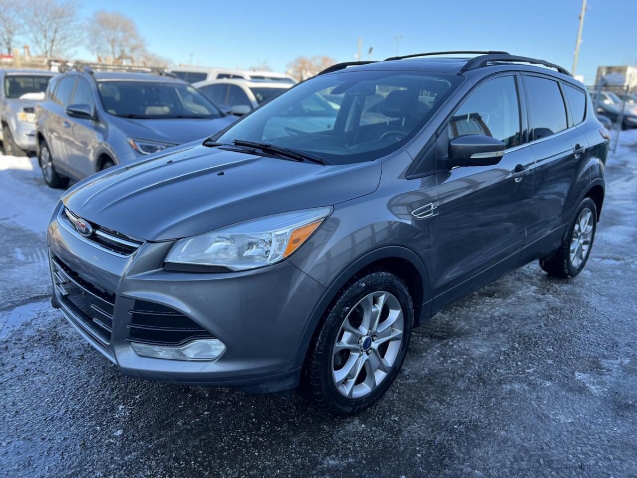 Just arrived. Grey on Black Leather Interior 2013 Ford Escape SEL 4WD. No Accidents! 143,663Kms. 2.0L EcoBoost. Runs Great. No issues. Loaded with Navigation System, Heated Front Bucket Seats, Intelligent Access Key with Push Button Start, Hands Free Power Liftgate, Reverse Sensing System, Remote Start System, Sony Audio System, Power Panoramic Vista Roof, Aluminum Wheels, Bluetooth, CD, 110-Volt Power Outlet, Power Driver Seat, and More! <br/> <br/> <br/> *Safety Certified at no extra cost* <br/> <br/> <br/> *Welcome to get vehicle checked by any mechanic before purchase* <br/> <br/> <br/> All in price : $9,499 plus HST and Licensing. <br/> <br/> <br/> Call : 647-303-2585 or 647-631-8755 <br/> <br/> <br/> Brampton Auto Center <br/> 69 Eastern Avenue, Brampton ON, L6W 1X9. Unit 206 <br/> <br/> <br/> Brampton Auto Center, welcomes you! Family owned dealership located in the GTA. We take pride in our work. Customer service is our priority. Full disclosure with honesty. We are OMVIC registered and proud member of the UCDA. You are welcomed to get the vehicle checked by any mechanic before purchase, for quality assurance. Financing available for all types of credit! Good, bad or no credit. No problem! We will get you approved. Warranty options available for any year, make or model! Contact dealer for more details. <br/>