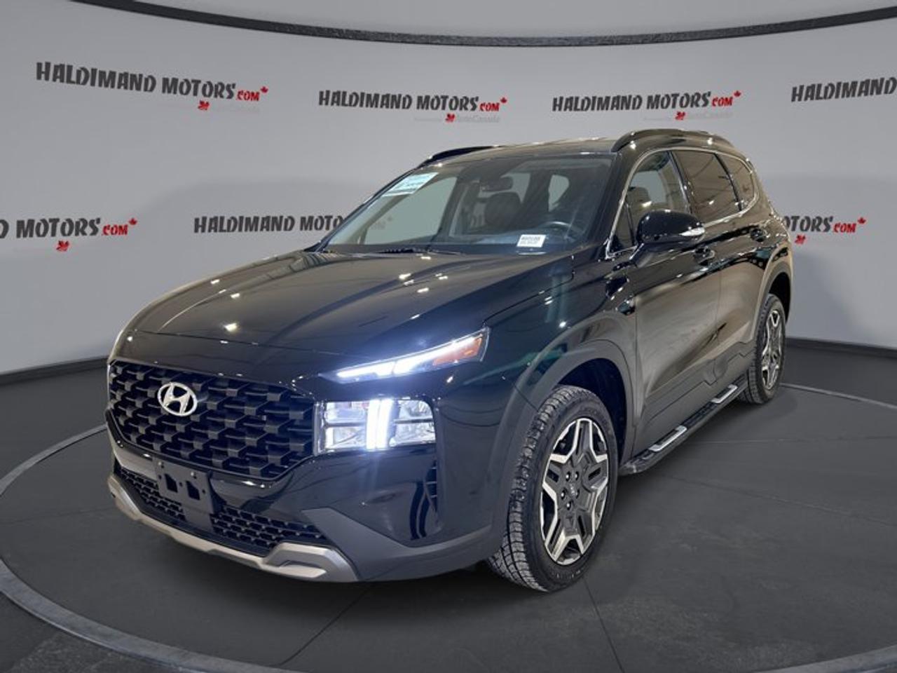 // ACCIDENT FREE!! // <br />// SINGLE OWNER! // <br /><br />Meet the 2023 Hyundai Santa Fe Urban AWD, a confident, family-ready SUV now available at Haldimand Motors Ltd. in Cayuga. This black, 4-door SUV has 55,110 km and pairs a 2.5 L gas engine with an 8-speed automatic transmission for smooth, easy driving in town and on the highway.<br /><br />With all-wheel drive and a well-rounded feature set, the 2023 Hyundai Santa Fe Urban AWD is a smart choice for Ontario roads and changing seasons. You will also enjoy everyday ease from push-button start, heated front seats, and dual-zone automatic climate control, all designed to keep the cabin comfortable and simple to manage.<br /><br />FEATURES OF THE Santa Fe Urban AWD | One owner | No accidents <br />   All-wheel drive for four-season confidence <br />   Push button start for quick getaways <br />   Heated front seats for cold mornings <br />   Built-in navigation for easy route planning <br /><br />ADVANCED SAFETY FEATURES <br />   Anti-lock braking system for controlled stops <br />   Stability control helps maintain steady handling <br />   Blind spot monitor for safer lane changes <br />   Lane departure warning adds extra awareness <br /><br />PERFORMANCE AND EFFICIENCY <br />   2.5 L gas engine for daily driving <br />   8-speed automatic transmission shifts smoothly <br />   Dual shift mode for added control <br />   Power steering for easy low-speed manoeuvres <br /><br />COMFORT AND CONVENIENCE <br />   Dual-zone automatic climate control for comfort <br />   Power windows for all-around convenience <br />   Drivers seat lumbar support helps reduce fatigue <br />   Drivers side power seat adjusts easily <br /><br />TECHNONOLGY AND CONNECTIVITY <br />   Navigation system helps plan every trip <br />   Bluetooth integration for hands-free calling <br />   Steering wheel audio controls keep focus <br />   Satellite radio and HD Radio ready <br /><br />CARGO SPACE <br />   Rear trunk access makes loading simple <br />   Rear spoiler adds style and function <br />   Steps help with entry and loading <br />   Tinted windows add privacy for cargo <br /><br />WHAT OTHER OWNERS LIKE <br />   Confident feel from all-wheel drive <br />   Helpful driver-assist safety technology features <br />   Comfortable cabin with easy-to-use controls <br />   Smooth automatic shifting for commuting <br /><br />Finished in black and equipped with LED headlamps, automatic headlights, heated mirrors, and turn signal mirrors, this Santa Fe is ready to look sharp and work hard. You also get practical touches like a backup camera, rear window defroster, automatic door locks, and tire pressure monitoring to help make daily driving simpler.<br /><br />This 2023 Hyundai Santa Fe Urban AWD | One owner | No accidentss VIN is: 5NMS3DAL2PH654993.<br /><br />WHY CHOOSE US? <br /><br />Honest & Transparent Buying Experience: Weve been a trusted name in business since 1984.<br /><br />STRAIGHTFORWARD PRICING:<br />Our Advertised Price Includes:<br />>>Safety Certification (No separate fee!)<br />>>30-Day 100% Mechanical Warranty<br />>>FREE Carfax History Report.<br />>>No upcharge for paying cash.<br />(Prices Exclude HST and Licensing Fees only.)<br /><br />>>Browse 300+ vehicles all in ONE LOCATION<br /><br />EASY FINANCING: Great rates & open loans<br /><br />WE BUY CARS: Get Top Dollar for your trade-in, or sell us your vehicle for CASH! Even if you dont buy from us!<br /><br />STOP BY TODAY<br />Treat yourself - stop by Haldimand Motors Ltd. located at 42 Talbot St E, Cayuga, ON N0A 1E0 to make this car yours today!<br /><br />https://www.haldimandmotors.com/used/stock-460188.html