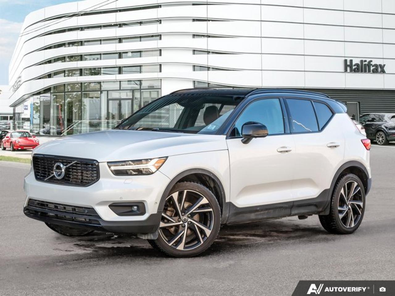 Now available at Porsche of Halifax, this *2019 Volvo XC40 R-Design* is finished in *White* and has *185,000 km*. This compact luxury SUV has been well maintained and is reported as well looked after according to the *Carfax Vehicle History Report*. A *winter wheel set is included*, adding year-round practicality.==== Performance & Driving ====  *   Turbocharged engine delivering responsive everyday performance  *   Automatic transmission for smooth operation  *   Confident handling with a comfortable ride quality  *   All-wheel drive capability (if equipped) for improved traction in varying conditions==== Interior & Comfort ====  *   R-Design interior with sport-focused styling details  *   Leather and Nubuck seating surfaces  *   Heated front seats  *   Dual-zone automatic climate control  *   Panoramic roof (if equipped) for added cabin light  *   Flexible rear cargo area with split-folding rear seats==== Technology & Safety ====  *   Touchscreen infotainment system  *   Apple CarPlay and Android Auto compatibility  *   Digital driver display  *   Backup camera  *   Volvo advanced safety systems including collision mitigation and lane keeping support==== Exterior ====  *   R-Design exterior styling accents  *   Alloy wheels  *   White exterior finish with contrasting trim  *   Winter wheel set includedThis XC40 R-Design offers a practical blend of sport styling, everyday comfort, and safety-focused engineering. With documented care and the added benefit of winter wheels, it is suited for year-round driving.Connect with us for more details or to arrange a test-drive with a Porsche Brand Ambassador at www.porscheofhalifax.com or 902-453-8800.