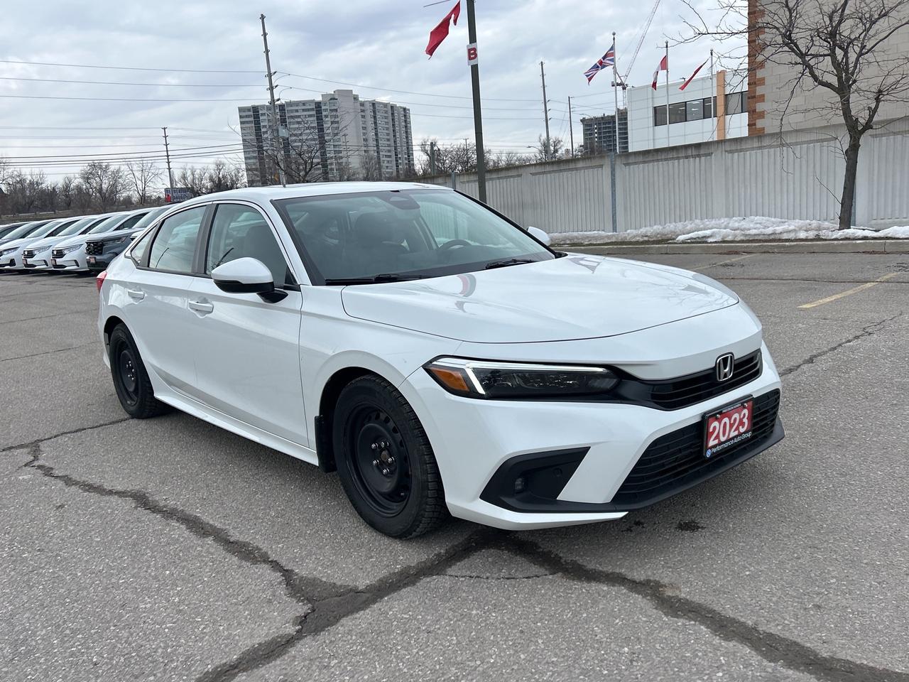 2023 Honda Civic Sedan Touring Leather  Navigation  Sunroof  CarPlay Photo