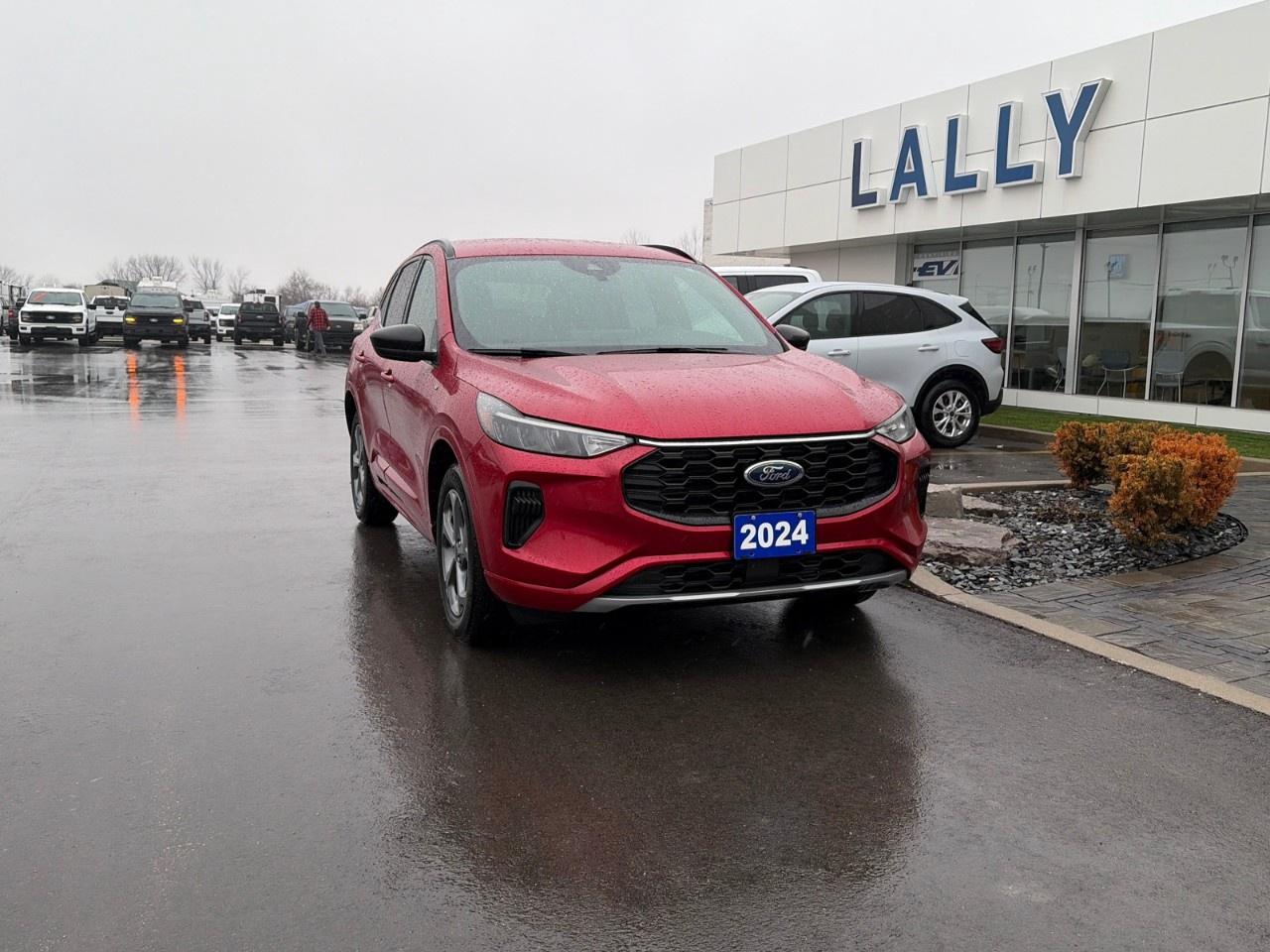 <p>The 2024 Ford Escape STLine AWD with the 1.5-litre EcoBoost engine is a compact SUV that blends sporty styling with efficient performance. It is powered by a turbocharged 1.5 L EcoBoost engine producing about <strong>180 horsepower and 199 lb-ft of torque</strong>, paired with an <strong>8-speed automatic transmission</strong> and <strong>Intelligent All-Wheel Drive</strong> for improved traction and stability in various driving conditions. The vehicle seats up to five passengers and offers practical cargo space, modern technology, and good fuel efficiencyaround <strong>9.2 L/100 km city and 7.4 L/100 km highway for AWD models</strong>making it a versatile option for everyday commuting and family use.</p>