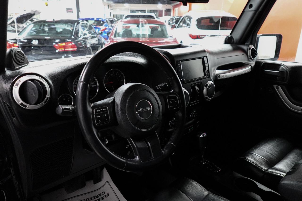 2012 Jeep Wrangler 4WD 4DR SAHARA - NAV, REMOTE START, HEATED SEATS Photo