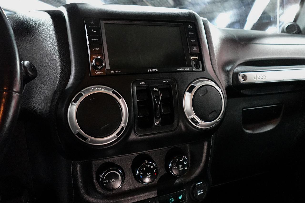 2012 Jeep Wrangler 4WD 4DR SAHARA - NAV, REMOTE START, HEATED SEATS Photo