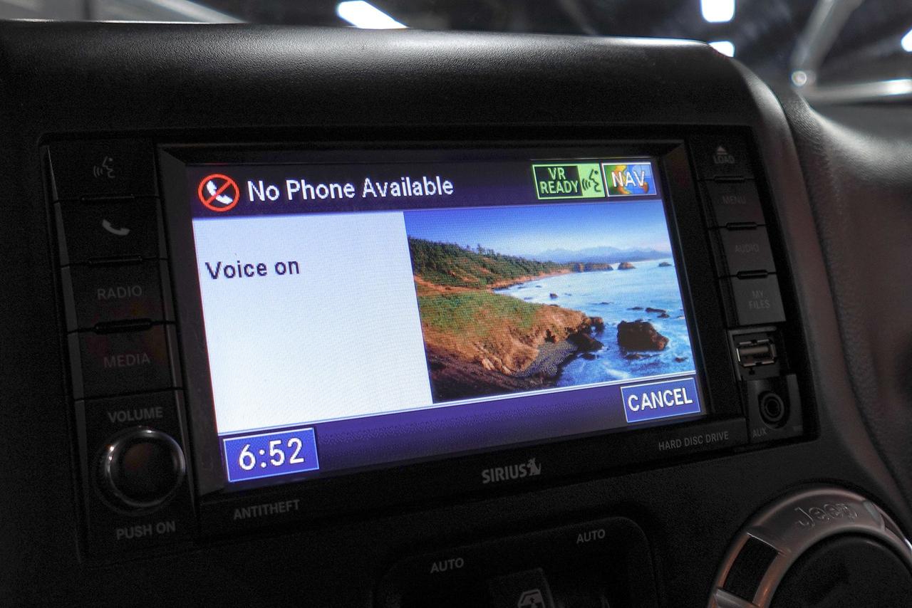 2012 Jeep Wrangler 4WD 4DR SAHARA - NAV, REMOTE START, HEATED SEATS Photo