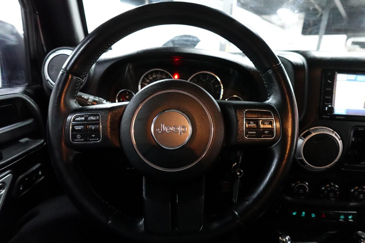 2012 Jeep Wrangler 4WD 4DR SAHARA - NAV, REMOTE START, HEATED SEATS Photo