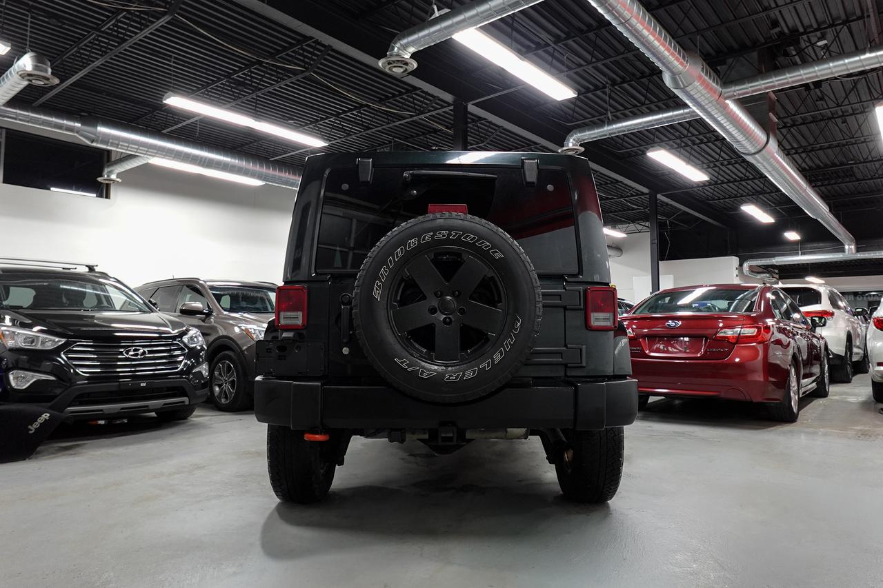 2012 Jeep Wrangler 4WD 4DR SAHARA - NAV, REMOTE START, HEATED SEATS Photo