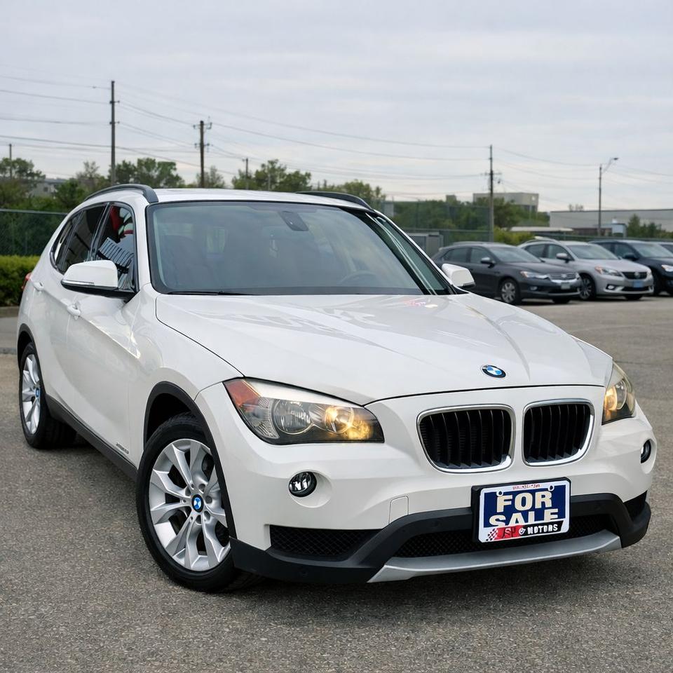 <p>2014 BMW X1 &ndash; White on Black | $9,990 + HST</p><p><br>💰 Price: $9,990 + Tax<br>🔧 Vehicle will be sold As-Is<br>✅ Certification available for $899<br><br><br>Key Features:<br>&bull; 2.0L Turbocharged 4-Cylinder Engine<br>&bull; Automatic Transmission<br>&bull; All-Wheel Drive (xDrive)<br>&bull; Dual-Zone Automatic Climate Control<br>&bull; Heated Front Seats<br>&bull; Panoramic Sunroof<br>&bull; Leather Interior<br>&bull; Power Adjustable Seats with Memory<br>&bull; Cruise Control<br>&bull; Power Windows, Locks, and Mirrors<br>&bull; Alloy Wheels<br>&bull; Fog Lights<br>&bull; Rear Folding Seats for Extra Cargo Space<br><br>Finances can be arranged for OAC.<br><br><br>JSP MOTORS<br>HAMILTON</p>