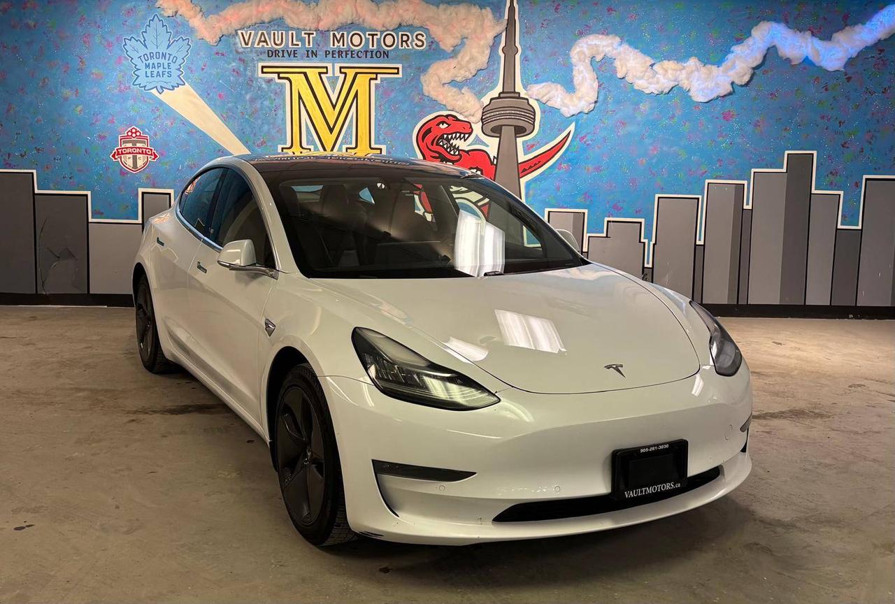 <p>2018 Tesla Model 3 Lone Range&nbsp;<span id=jodit-selection_marker_1772662188155_5846227721209295 data-jodit-selection_marker=start style=line-height: 0; display: none;></span> / ONE OWNER&nbsp;</p><p><br></p><p><p><span>Drive home in the car youve been waiting for with<span>&nbsp;</span></span><strong>$0 Down On Approved Credit</strong><span><span>&nbsp;</span>(OAC)</span><span>! At our dealership, we make it easier than ever to get behind the wheel of a reliable, stylish vehicle without the big upfront cost. Whether youre upgrading, buying your first car, or treating yourself to something new, were here to help you get approved and rolling today. Dont waityour next ride is ready when you are!</span><br></p></p><p><br></p><p>FEATURES: LARGE 15 INCH CENTRAL TOUCHSCREEN - DUAL ZONE CLIMATE CHANGE - POWER WINDOWS - AUTO PILOT -&nbsp; HEATED SEATS - FAST CHARGING SUPPORT - SAFETY TECH -&nbsp;CARGO + FRONT TRUNK - POWER STEELING WHEEL - WIFI AND LTE INTERNET CONNECTION - BLUETOOTH AND AUDIO STREAMING - NAVIAGTION SYSTEM - REAR VIEW CAMERA - AUTO BRAKE - KEYLESS ENTRY - PANORAMIC GLASS ROOF - PREMIUM S0UND AND LOTS MORE !!&nbsp;</p> <p>BAD CREDIT, NO CREDIT NOT A PROBLEM. APPLY TODAY ON OUR WEBSITE WWW.VAULTMOTORS.CA OR COME VISIT OUR DEALERSHIP! &nbsp;</p><p> <br></p><p>WE WORK WITH ALL MAJOR BANKS TO GET YOU APPROVED!&nbsp;DEPENDS ON YOUR CREDIT HISTORY. CONTACT US TODAY AND LET OUR FAMILY SHOW YOU THE DIFFERENCE. Prices are plus HST & Licensing.&nbsp;<span id=jodit-selection_marker_1686168059819_6514763025256252 data-jodit-selection_marker=start style=line-height: 0; display: none;></span> </p><p><br></p><p>Please check our website www.vaultmotors.ca&nbsp; Please verify any information in question with our sales associates.</p><p> <br></p><p>All vehicles can be certified and E-tested for an additional fee from $895, depending on the make and model. If not Certified and E-tested, as per OMVIC Regulations, the vehicle is deemed to be not drivable, not E-tested, and Not Certified.&nbsp;&nbsp;</p><p> <br></p><p>-PROFESSIONALLY CLEANED INSIDE AND OUT -CAR PROOF HISTORY REPORT PROVIDED WITH EACH VEHICLE &nbsp; Trade-ins - We take any year and model! Bring in your old vehicle for a free appraisal. &nbsp;</p><p><br></p><p>#TeamVault #FamilyCars #SportsCars&nbsp;#Honda #Toyota #Hyundai #Nissan #BMW #Mercedes #Volkswagen #Porsche #Acura #Mississauga #Toronto #Showroom</p><p><br></p><p>BUY WITH CONFIDENCE!</p><p> &nbsp; <br></p><p>We are OMVIC registered and a member of Used Car Dealer Association</p><p>. &nbsp; &nbsp;&nbsp; VAULT MOTORS&nbsp; DRIVE IN PERFECTION &nbsp; </p><p>www.vaultmotors.ca </p><p><br></p><p>1650 Dundas Street East Mississauga ON L4X 2Z3&nbsp; </p><p>&nbsp;<br></p><p> Telephone 905-281-3030 </p><p><br></p><p>Monday to Saturday: 10:00AM TO 8:00PM</p><p> Sunday Appointment</p>