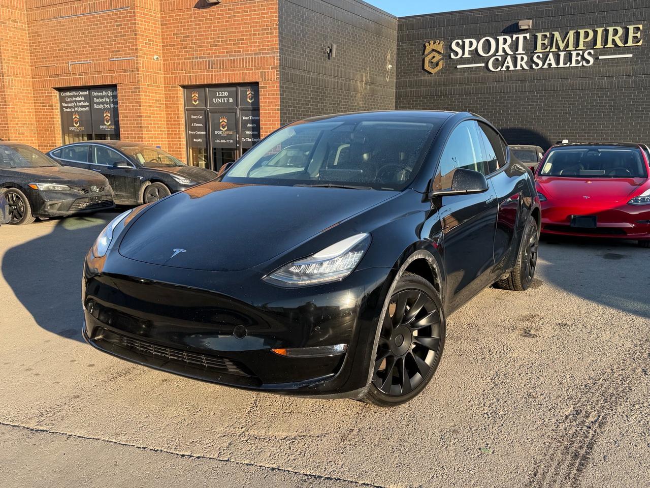*FULLY LOADED* *LONG RANGE* *AWD* *MINT CONDITION* *HEATED SEATS* *CERTIFIED* *AUTOMATIC* *REVERSE CAMERA* *BLIND SPOT MONITORING* Safety Certified NOT included in Price | By Appointment Only: 416-606-7758 Year: 2022 Price: $29,800+HST Make: Tesla Model: Y Trim: Long Range AWD Kms: 88,614 Sport empire cars Offering a beautiful Tesla Model Y Long Range AWD with only 88,614 kms!! For the affordable price of $29,800+HST and licensing. Beautiful Black exterior with a Black leather interior. Vehicle comes SAFETY CERTIFIED!! Professionally detailed and ready to go. Perfect combination of reliability, comfort and luxury. Buy with Trust with an Ontario registered dealer. VIN: 7SAYGDEEXNF364691
