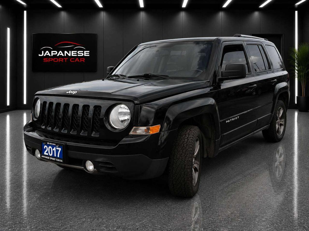 Safety & warranty, Trades are welcome. Need financing? No problem, we deal with many financial companies that can help buyers finance the vehicle they want! Any credit welcome. We offer FREE vehicle delivery anywhere in the Niagara Region! Have It Shipped Directly To Your Door!  Need Bluetooth or a backup camera? Ask us about available upgrades and professional installation before delivery!  Japanese Sport Car has been serving Canadians for over 27 years, and we strive to provide the best service possible to customers all over Canada! BUY WITH CONFIDENCE! OMVIC & UCDA Registered dealer, specializing in Commercial Trucks for over 27 years! Full specs & features 2017 Jeep PATRIOT Trim  HIGH ALTITUDE EDITION Powertrain  Auto, 4WD, 2.4L 4cyl, Gas Odometer  221XXX KM Exterior/interior colour  Black / Black Seats  5 Doors  4 VIN  1C4NJRAB3HD172146 U-connect Bluetooth Air Type: Air Conditioning Seat Covering Type: Leather Adjustable Steering Wheel Cruise Control Power Steering Rear Defrost Radio Equipment: AM/FM/CD Satellite Radio Power Driver Seat Heated Front Seats Power Windows Power Locks Power Mirrors Traction Control Power Seats: Driver Heated Seats: Front Only Roof Type: Sunroof/Moonroof Fog Lights ABS We offer a comprehensive Client Care Package for only $799 which includes a certified safety inspection and a 2-year Silver Powertrain Warranty with UNLIMITED kilometers giving you confidence and coverage from day one. All prices do not include certification, applicable taxes (HST) and licensing fees. Without certification, as per OMVIC regulations, the vehicle is not road worthy, not E-tested, nor certified.