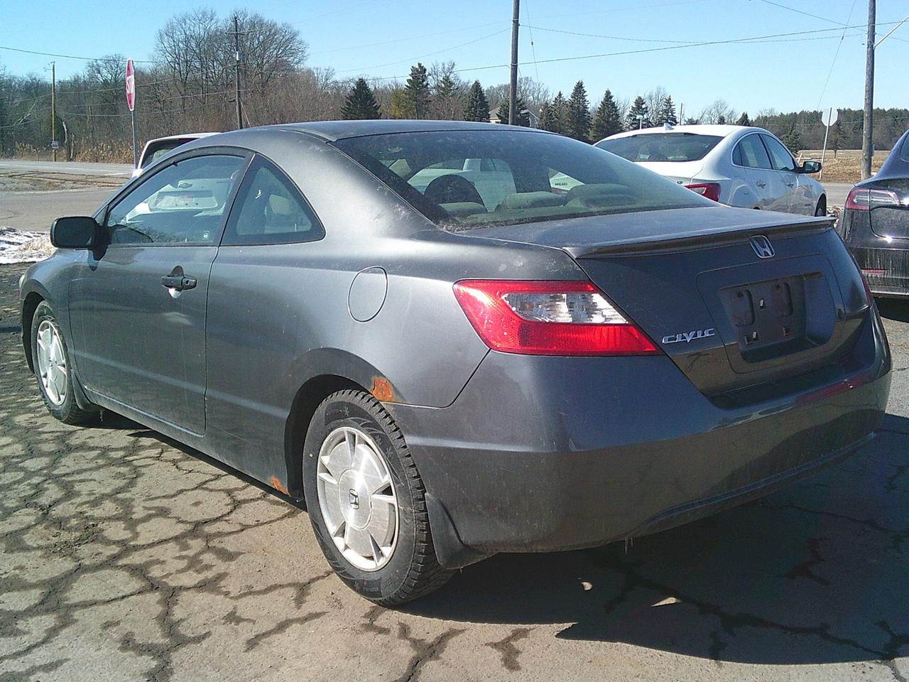 2009 Honda Civic COUPE 2dr Man DX-G Photo