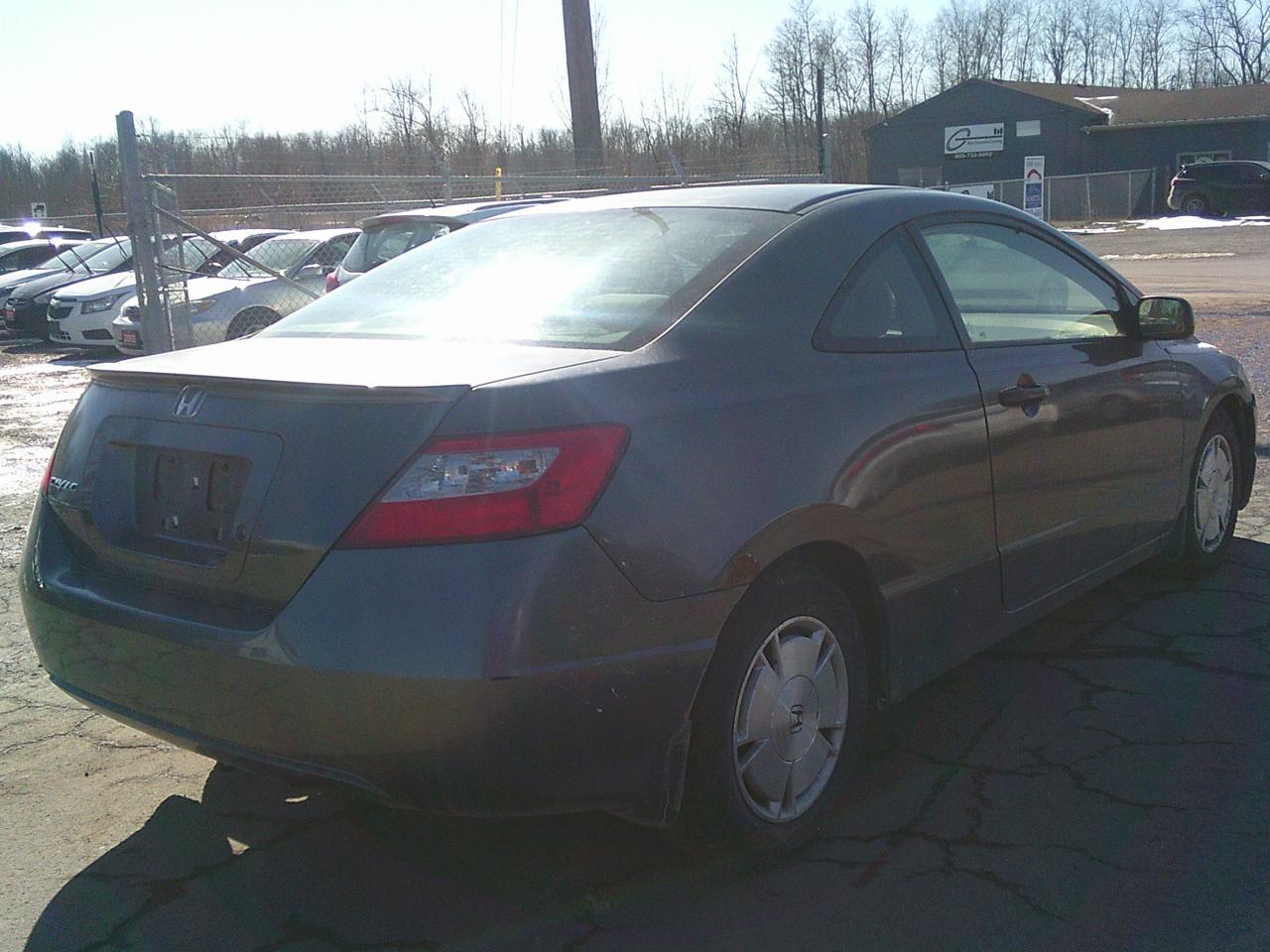 2009 Honda Civic COUPE 2dr Man DX-G Photo