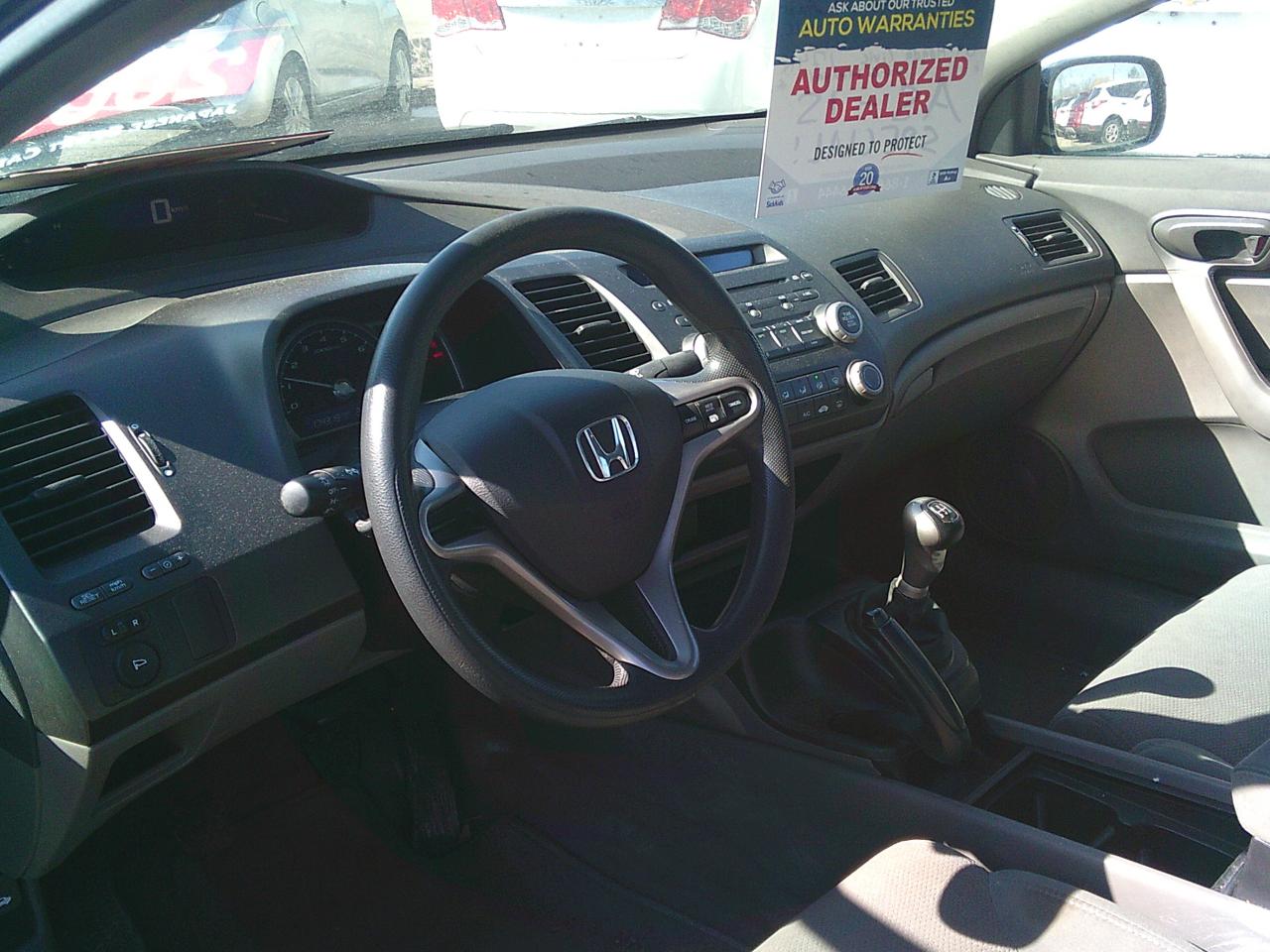 2009 Honda Civic COUPE 2dr Man DX-G Photo