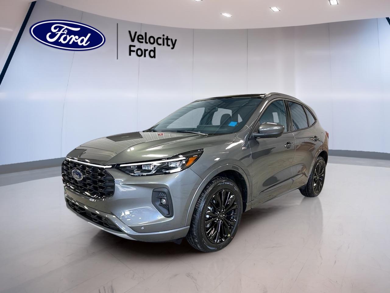 // ACCIDENT FREE!! //

Meet the SUV 2026 Ford Escape ST-Line Elite AWD Used at Velocity Ford in Moose Jaw. With only 72 km on the odometer, this grey Escape offers a near-new feel with the value of a used vehicle. It blends confident all-wheel-drive traction with everyday comfort.

Under the hood, this 2026 Ford Escape ST-Line Elite AWD uses a 2.0 L unleaded engine paired with an automatic transmission. With 4 doors and a clean black interior, it is ready for commutes, school runs, and weekend drives. Remote start adds comfort on cold Saskatchewan mornings.

ADVANCED SAFETY FEATURES  
»» Anti-lock braking system for controlled stops  
»» Stability control helps maintain steady handling  
»» Blind spot monitor for safer lane changes  
»» Lane departure warning adds extra awareness  

PERFORMANCE AND EFFICIENCY  
»» 2.0 L unleaded engine power  
»» Automatic transmission for smooth, easy driving  
»» All-wheel drive for year-round traction  
»» Limited slip differential improves grip  

COMFORT AND CONVENIENCE  
»» Dual-zone climate control for personalized comfort  
»» Heated front seats for winter warmth  
»» Driver lumbar support reduces fatigue  
»» Power liftgate for easier loading  

TECHNONOLGY AND CONNECTIVITY  
»» Navigation system helps plan every route  
»» Bluetooth integration for hands-free calling  
»» WiFi hotspot helps keep you connected  
»» Satellite radio adds more listening choices  

CARGO SPACE  
»» Rear trunk access makes loading simple  
»» Remote trunk release adds quick convenience  
»» Power liftgate supports hands-free style loading  
»» Spare tire included for added confidence  

WHAT OTHER OWNERS LIKE  
»» All-wheel drive confidence in poor weather  
»» Easy-to-use infotainment and navigation  
»» Helpful driver aids for daily commuting  
»» Heated seats and remote start comfort  

This Escape also includes practical features that make daily driving easier in Moose Jaw. Cruise control helps on longer highway stretches, while power steering keeps low-speed manoeuvres light and simple. Power windows and automatic door locks add everyday convenience, and child safety locks help protect younger passengers.

Visibility is well supported with LED headlamps, automatic headlights, fog lights, and heated mirrors. Tinted windows and a rear spoiler add a sporty finish, while the backup camera helps when reversing into tight parking spots. Inside, you also get steering wheel audio controls, an adjustable steering wheel, ambient lighting, and an auto-dimming rearview mirror for reduced glare at night.

For added peace of mind, this 2026 Ford Escape ST-Line Elite AWD includes a full set of airbags, including driver airbag, passenger airbag with sensor, side impact airbags, and head side airbags. Tire pressure monitoring helps you stay on top of maintenance, and performance tires support confident road feel.

This 2026 Ford Escape ST-Line Elite AWDs VIN is: 1FMCU9PA7TUA25622.