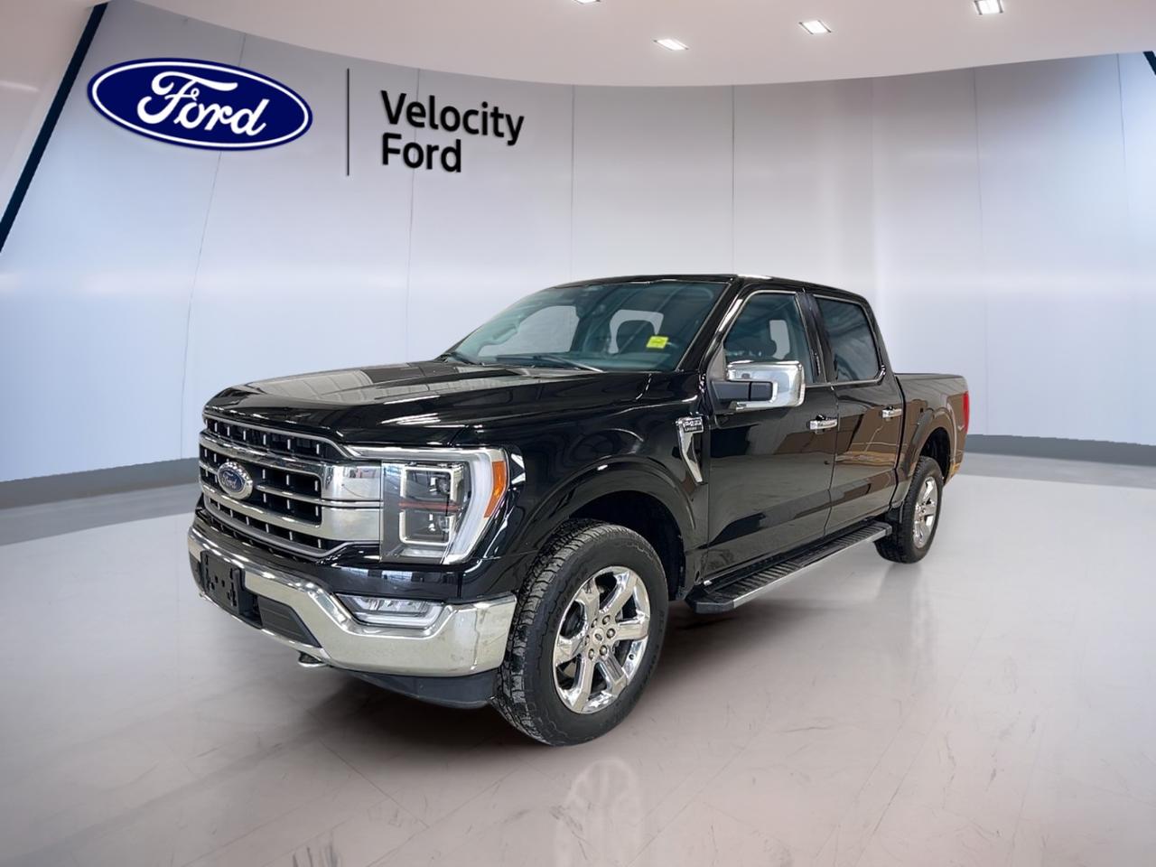 // ACCIDENT FREE!! //  
// SINGLE OWNER! //  

At Velocity Ford in Moose Jaw, this used 2021 Ford F-150 LARIAT with Chrome Package, FX4 Off-Road Package, and Max Trailer Tow Package is ready for real work and real comfort. CARFAX Canada reports no accidents, and it is a single-owner truck. Finished in Black with a Black interior, it has 103,901 km and a 5.0 L unleaded V8 paired with an automatic transmission.

This 2021 Ford F-150 LARIAT with Chrome Package, FX4 Off-Road Package, and Max Trailer Tow Package is built for drivers who want confidence on the highway and capability off the pavement. With four doors, four-wheel drive, and off-road tires, its set up for changing prairie weather and weekend escapes. The included towing capacity of 4,717 kg gives you the muscle for serious hauling.

FEATURES OF THE F-150 LARIAT With Chrome Pkg, FX4 OFFROAD Pkg, & Max Trailer Tow Pkg ONE OWNER NO ACCIDENTS  
»» Chrome Package adds bold exterior accents  
»» FX4 package supports off-road focused capability  
»» Max Trailer Tow package boosts towing confidence  
»» Four-wheel drive for tough road conditions  

TRUCK FEATURES  
»» Towing capacity rated at 4,717 kg  
»» Four-wheel drive for year-round traction  
»» Rear tow hook for recovery support  
»» Off-road tires for rougher terrain  

ADVANCED SAFETY FEATURES  
»» Anti-lock braking system helps maintain control  
»» Stability control supports confident handling  
»» Blind spot monitor aids safer lane changes  
»» Lane departure warning helps reduce drift  

PERFORMANCE AND EFFICIENCY  
»» 5.0 L unleaded V8 power  
»» Automatic transmission with dual shift mode  
»» Four-wheel drive for added grip  
»» Power steering for easy low-speed manoeuvres  

COMFORT AND CONVENIENCE  
»» Dual-zone automatic climate control comfort  
»» Heated front seats for cold mornings  
»» Remote starter for quick warm-ups  
»» Memory seats and memory mirrors  

TECHNONOLGY AND CONNECTIVITY  
»» Navigation system helps plan every route  
»» Bluetooth integration for hands-free calling  
»» WiFi hotspot helps keep devices connected  
»» Satellite radio and HD Radio  

CARGO SPACE  
»» Four-door access for easier loading  
»» Rear trunk access adds everyday practicality  
»» Spare tire onboard for added readiness  
»» Tinted windows help protect interior items  

WHAT OTHER OWNERS LIKE  
»» Strong V8 power for towing  
»» Comfortable cabin for long drives  
»» Helpful driver aids for commuting  
»» Confident four-wheel drive capability  

This 2021 Ford F-150 LARIAT With Chrome Pkg, FX4 OFFROAD Pkg, & Max Trailer Tow Pkg ONE OWNER NO ACCIDENTSs VIN is: 1FTFW1E55MFC13547.