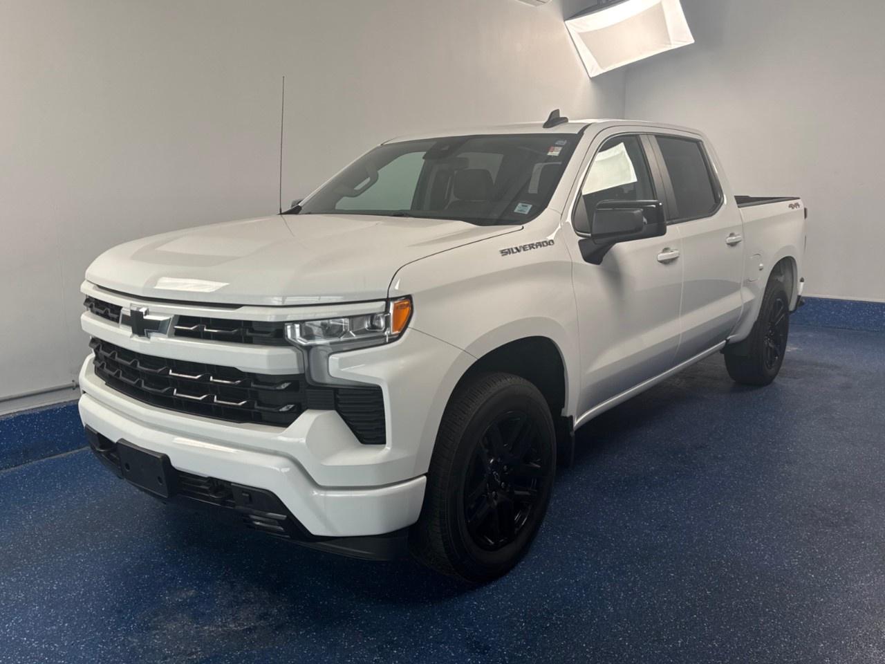 New Price! 2024 Chevrolet Silverado 1500 RST Crew Cab RST | 5.3L V8 | Low Kms | Zacks Certified. 10-Speed Automatic 4WD Summit White EcoTec3 5.3L V8<br />Odometer is 1091 kilometers below market average!<br /><br />10-Speed Automatic, 4WD, Jet Black w/Cloth Seat Trim, 10-Way Power Driver Seat w/Lumbar, 12.3''' Multicolour Reconfigurable Digital Display, 120-Volt Bed Mounted Power Outlet, 120-Volt Interior Power Outlet, 2 USB Data Ports, 6-Speaker Audio System, AM/FM radio: SiriusXM with 360L, Apple CarPlay/Android Auto, Auto-Locking Rear Differential, Bluetooth® For Phone, Chevrolet Connected Access Capable, Colour-Keyed Carpeting Floor Covering, Convenience Package, Convenience Package II, Deep-Tinted Glass, Dual Rear USB Ports (Charge Only), Dual-Zone Automatic Climate Control, Electric Rear-Window Defogger, Electrical Steering Column Lock, Electronic Cruise Control, Electronic Transmission Range Selector Shifter, EZ Lift Power Lock & Release Tailgate, Floor Mounted Centre Console, Forward Collision Alert, Front Bucket Seats, Front fog lights, Front Frame-Mounted Black Recovery Hooks, Front LED Fog Lamps, Front Rubberized Vinyl Floor Mats, HD Rear Vision Camera, Heated front seats, Heated Power-Adjustable Outside Mirrors, Heated Steering Wheel, Heated steering wheel, High Capacity Suspension Package, High Gloss Black Mirror Caps, Hitch Guidance, Hitch Guidance w/Hitch View, In-Vehicle Trailering System App, Inside Rear-View Mirror w/Tilt, Keyless Open & Start, LED Cargo Area Lighting, OnStar & Chevrolet Connected Services Capable, Power Front Windows w/Driver Express Up/Down, Power Front Windows w/Passenger Express Down, Power Rear Windows w/Express Down, Power Sliding Rear Window w/Rear Defogger, Power windows, Preferred Equipment Group 1SP, Premium audio system: Chevrolet Infotainment 3 Premium, Premium Bose 7-Speaker Sound System, Rear 60/40 Folding Bench Seat (Folds Up), Rear Rubberized-Vinyl Floor Mats, Remote keyless entry, Remote Vehicle Starter System, SiriusXM w/360L, Standard Suspension Package, Standard Tailgate, Steering Wheel Audio Controls, Theft Deterrent System (Unauthorized Entry), Tilt steering wheel, Trailering Package, True North Edition, Universal Home Remote, Wheels: 20''' x 9''' High Gloss Black Painted Alum, Wi-Fi Hot Spot Capable, Wireless Charging, Wrapped Steering Wheel.<br /><br />Certification Program Details: Fresh 2 Yr MVI | 30 day warranty* | 110 point inspection | Full tank of fuel | Krown rustproofed | Flexible financing options | Professionally detailed<br /><br />This vehicle is Zacks Certified! You're approved! We work with you. Together we'll find a solution that makes sense for your individual situation. Please visit us or call 902 843-3900 to learn about our great selection.<br /><br />With 22 lenders available Zack's Auto Sales can offer our customers with the lowest available interest rate. Thank you for taking the time to check out our selection!
