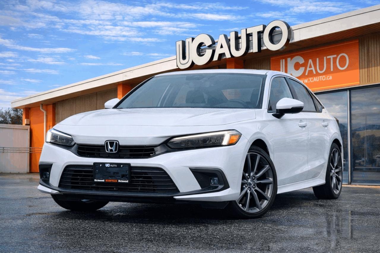 <p>2023 HONDA CIVIC TOURING</p><p>TRUE PRICE, NO HIDDEN FEE, FREE CARFAX, FULL INSPECTION</p><p>NO ACCIDENT, BC LOCAL, ONE OWNER</p><p>Highlight Features</p><p>- Backup Camera</p><p>- Navigation System</p><p>- Blind Spot Monitor</p><p>- Lane Keeping Assist</p><p>- Pre-Collision System</p><p>- Bose Sound System</p><p>- Heated Seats</p><p>- Heated Steering Wheel</p><p>- Power Sunroof</p><p>- Bluetooth Technology</p><p>- FM/AM Radio</p><p>- Adaptive Cruise Control</p><p>- Voice Control</p><p>- Variable Driving Mode</p><p>- AND MUCH MORE</p><p><br></p><p><p>Although every attempt is made to ensure the accuracy of the data above, due to the possibility of human error, we cannot guarantee the accuracy of the displayed information, the availability of this vehicle, or the accuracy of its photo or stock photo. Such information may not reflect exact vehicle color, trim, options, price or other specifications.<br></p><p><br></p><p><br></p><br><p><br></p><p><strong><strong><strong><br></strong></strong></strong></p><p><strong><strong><strong><span>*** FULL CARFAX REPORT AND INSPECTION PAPER AVAILABLE!!***</span></strong></strong></strong></p><p><strong><strong><strong><span>*** BEST VALUE FOR YOUR TRADE-IN OR SELL US YOUR CARS!!***</span></strong></strong></strong></p><p><strong><strong><strong><span>*** COMPETITIVE RATE FOR FINANCING!!***</span></strong></strong></strong></p><p><br></p><p><br></p><p><strong><strong><strong><span><br></span></strong></strong></strong></p><p><strong><strong><strong><strong>DL#40299 UC Auto</strong></strong></strong></strong><br></p><p><strong><strong><strong><span>3891 No 3 Rd, Richmond, BC V6X 2B8</span></strong></strong></strong></p><p><span><strong>*All price excludes $495 Doc Fee&&nbsp;395$Preparation Fee and applicable taxes.*</strong></span></p><p><strong><span>*Finance and Lease option available on vehicle year 2014<span>&nbsp;</span>or newer*</span></strong></p><span id=jodit-selection_marker_1772583522404_3580913722978434 data-jodit-selection_marker=start style=line-height: 0; display: none;></span><br></p>