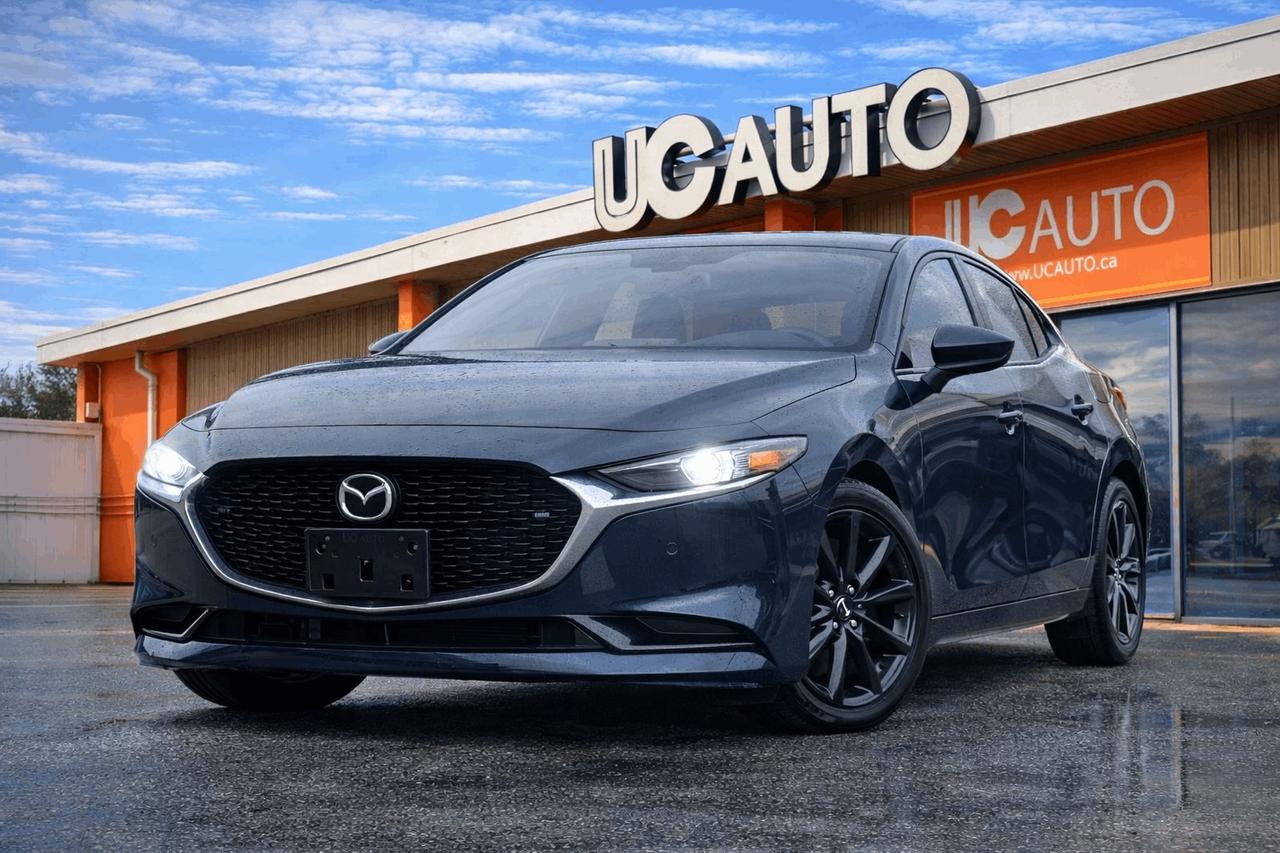 <p>2021 MAZDA 3 GT TURBO AWD</p><p>TRUE PRICE, NO HIDDEN FEE, FREE CARFAX, FULL INSPECTION</p><p>NO ACCIDENT OVER 2K, BC LOCAL</p><p>Highlight Features</p><p>- 360 Degree Backup Camera</p><p>- Navigation System</p><p>- Blind Spot Monitor</p><p>- Heads-Up Display</p><p>- Lane Keeping Assist</p><p>- Pre-Collision System</p><p>- Bose Sound System</p><p>- Power Sunroof</p><p>- Bluetooth Technology</p><p>- FM/AM Radio</p><p>- Adaptive Cruise Control</p><p>- Voice Control</p><p>- Variable Driving Mode</p><p>- AND MUCH MORE</p><p><p>Although every attempt is made to ensure the accuracy of the data above, due to the possibility of human error, we cannot guarantee the accuracy of the displayed information, the availability of this vehicle, or the accuracy of its photo or stock photo. Such information may not reflect exact vehicle color, trim, options, price or other specifications.<br></p><p><br></p><p><br></p><br><p><br></p><p><strong><strong><strong><br></strong></strong></strong></p><p><strong><strong><strong><span>*** FULL CARFAX REPORT AND INSPECTION PAPER AVAILABLE!!***</span></strong></strong></strong></p><p><strong><strong><strong><span>*** BEST VALUE FOR YOUR TRADE-IN OR SELL US YOUR CARS!!***</span></strong></strong></strong></p><p><strong><strong><strong><span>*** COMPETITIVE RATE FOR FINANCING!!***</span></strong></strong></strong></p><p><br></p><p><br></p><p><strong><strong><strong><span><br></span></strong></strong></strong></p><p><strong><strong><strong><strong>DL#40299 UC Auto</strong></strong></strong></strong><br></p><p><strong><strong><strong><span>3891 No 3 Rd, Richmond, BC V6X 2B8</span></strong></strong></strong></p><p><span><strong>*All price excludes $495 Doc Fee&&nbsp;395$Preparation Fee and applicable taxes.*</strong></span></p><p><strong><span>*Finance and Lease option available on vehicle year 2014<span>&nbsp;</span>or newer*</span></strong></p><span id=jodit-selection_marker_1772583005947_7817826683496076 data-jodit-selection_marker=start style=line-height: 0; display: none;></span><br></p><p><br></p>