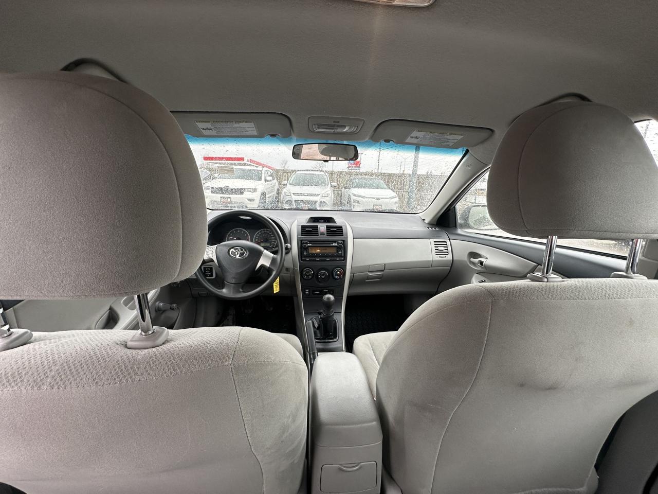 2012 Toyota Corolla CE, MANUAL, 4 CYL, RUNS AND DRIVES, AS IS SPECIAL Photo