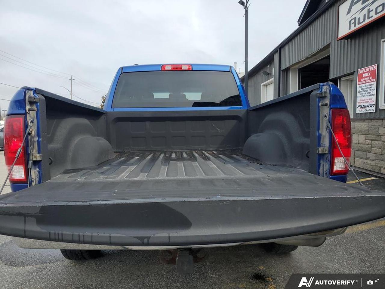 2017 RAM 1500 4WD QUAD CAB 140.5" ST Photo