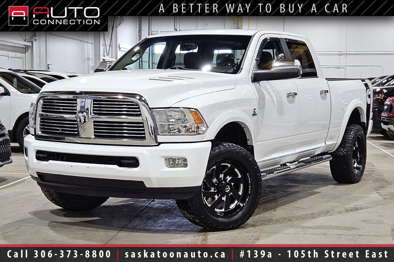 <p><span>Crew Cab w/ 6.4ft. Box - Accident Free - SK Truck - Low KMs</span><span><br></span><span><br>Introducing a clean, well-optioned <b>2012 RAM 2500 Laramie Limited</b> - a 4x4 heavy-duty pickup built around the torque of the 6.7L Cummins turbo-diesel and a stout 6-speed automatic transmission to handle serious work. This crew cab with the 6.4-foot box wears bright white paint and a dark slate grey leather interior that balances durability with upscale comfort. With 133,392 kilometers on the odometer, the truck is accident-free and is local to Saskatchewan, so you can buy with confidence about its regional history. Inside you will find cooled and heated front seats, heated rear seats, a heated steering wheel, dual-zone automatic climate control and convenient driver memory and remote start - creature comforts that make prairie winters and long hauls much easier. The tech package is equally useful: integrated GPS navigation, Bluetooth calling and audio streaming, a 9-speaker Alpine premium sound system with subwoofer, and a rear-seat video system to keep passengers entertained. Backing and parking are simple thanks to ParkView rear back-up camera and Park-Sense rear park assist, while LED interior lighting, a power moonroof and a rear power-sliding window add everyday convenience. If you need capability, the factory trailering package, integrated trailer brake controller, power & heated chrome tow mirrors, Mopar spray-in bedliner and an 11.50-inch single wheel rear axle with anti-spin differential combine for a rated 12,650 lb. towing capacity. Practical extras like the 115V auxiliary outlet and a rugged 6-speed automatic paired to the Cummins mean this truck is as useful on job sites as it is comfortable on the highway. Come see it at Saskatoon Auto Connection - fully inspected, road-tested, and ready to earn its next miles.<br><br></span><span>Key Features:</span><span><br></span><span><br>- 4x4<br>- Limited Decor Group<br>- Protection Group<br>- Cooled & Heated Front Seats<br>- Heated Rear Seats<br>- Heated Steering Wheel<br>- Remote Start<br>- Rear Seat Video System<br>- GPS Navigation<br>- Power Moonroof<br>- 9-Speaker Alpine Premium Sound System w/ Subwoofer<br>- Park-Sense Rear Park Assist System<br>- ParkView Rear Back-Up Camera<br>- Dual-Zone Automatic Climate Control<br>- Bluetooth Calling & Audio Streaming<br>- Drivers Seat Memory Settings<br>- Rear Power-Sliding Window<br>- LED Interior Lighting<br>- 115V Auxiliary Power Outlet<br>- Power & Heated Chrome Trailer Tow Mirrors<br>- Trailering Package<br>- Mopar Spray-In Bedliner<br>- Integrated Trailer Brake Controller<br>- 12,650lb. Towing Capacity<br>- 11.50-Inch Single Wheel Rear Axle<br>- Anti-Spin Differential Rear Axle<br>- 6-Speed Automatic Transmission<br>- 6.7L Cummins Turbo Diesel Inline Six Engine<br><br><b>Exterior Colour:</b> Bright White<br><b>Interior Colour:</b> Dark Slate Grey Leather<br><br><b>Manufacturers Brochure:</b> </span><a href=https://cdn.dealereprocess.org/cdn/brochures/ram/2012-2500.pdf target=_blank><span>https://cdn.dealereprocess.org/cdn/brochures/ram/2012-2500.pdf</span></a><span><br><br></span><span>Unlock a full year of exclusive VIP benefits with your purchase! Enjoy 20% off labour, 25% off tires, free windshield stone chip repairs, and so much more. Visit saskatoonauto.ca for all the details.<br></span><span><br>Honesty Pricing eliminates the haggle hassle by providing you with our lowest possible selling price up front. In fact, it is the lowest price in our market, and we will prove it by disclosing a comprehensive market report of what our competitors are selling similar vehicles for.<br></span><span><br>This vehicle meets our Diamond Certification standard, which begins by selecting only premium quality vehicles and subjecting them to a much more comprehensive inspection process than typical dealerships use. Diamond Certified ensures a clean history, exceptional appearance and problem-free operation.<br></span><span><br>At Saskatoon Auto Connection we sell pre-owned automobiles the way we would like to buy them ourselves. Since 2008, we have been dedicated to providing the highest level of integrity and transparency in our industry, in combination with the highest quality vehicles at the most competitive prices in Saskatchewan. Our friendly staff is ready to positively redefine your expectations of the pre-owned automobile space.</span><span></span></p>