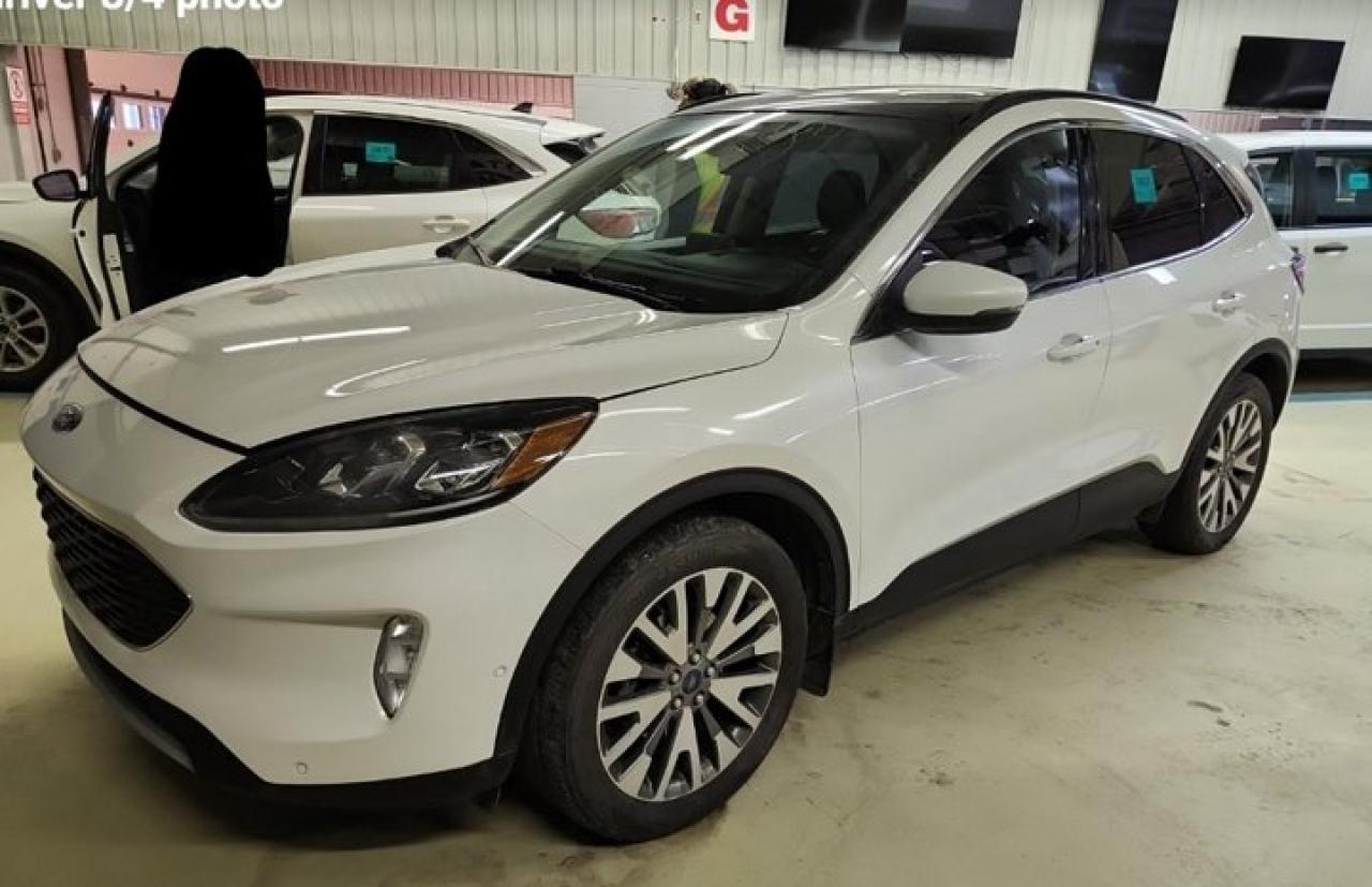 Check out this certified 2020 Ford Escape Titanium AWD | Leather | Sunroof | Tow Pkg | Nav | Heated Seats | Power Seat | CarPlay & More !. Its Automatic transmission and 2.0 L engine will keep you going. This Ford Escape has the following options: Tow Package, Sunroof, Reverse Camera, Navigation System, Leather, Air Conditioning, Heated Seats, Tilt Steering Wheel, Steering Radio Controls, and Power Windows. Stop by and visit us at Mark Wilsons Better Used Cars, 5055 Whitelaw Road, Guelph, ON N1H 6J4.MASSIVE SELECTION: 500+ vehicles in ONE LOCATION, all Live Market Priced for the best value!STRAIGHTFORWARD & TRANSPARENT PRICING: Our Advertised Price INCLUDES:Safety Certification! (No separate certification fee upcharge).FREE Carfax History Report!NO upcharge for paying cash!CONFIDENCE & PEACE OF MIND: 30-Day/3,000 km Warranty INCLUDED! Plus a 5-Day Exchange Privilege!*EASY FINANCING: Better-than-bank rates, $0 Down, and 3 Months No Payments available OAC. BAD CREDIT APPROVED HERE!WE BUY CARS: Get Top Dollar for your trade, or sell us your vehicle for CASH even if you dont buy ours!www.shopwilsons.comAn Honest, Transparent Buying Experience. Trusted in business since 1961!(Cash Prices Exclude HST and Licensing Fees only.)