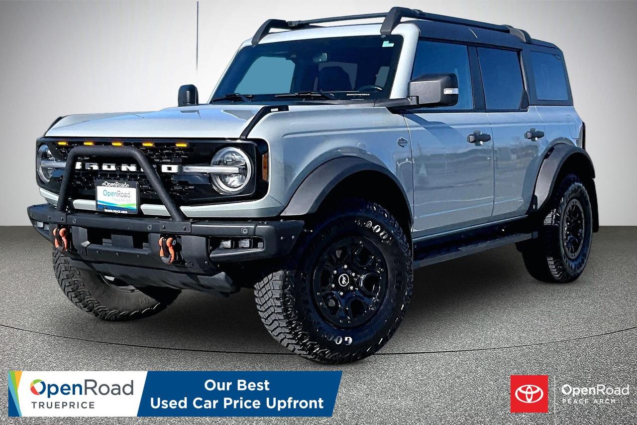 The 2024 Ford Bronco Wildtrak 4 Door 4x4 is a rugged off-road SUV designed for high-performance trail capability. It is powered by a 2.7-litre twin-turbo EcoBoost V6 producing about 315 horsepower and 556 Nm of torque, paired with a 10-speed automatic transmission and advanced four-wheel drive. The Wildtrak includes the Sasquatch off-road package with 35-inch tires, beadlock-capable wheels, high-clearance suspension, and locking front and rear differentials for challenging terrain. It also features Ford&rsquo;s G.O.A.T. terrain management system with multiple drive modes, Trail Control, and Trail Turn Assist. Inside, it offers an 8-inch touchscreen with SYNC 4, Apple CarPlay and Android Auto, removable roof panels, durable interior materials, and modern driver-assist technologies.  Have confidence with your OpenRoad purchase! Every OpenRoad Certified Pre-Owned vehicle comes fully reconditioned and complete with a comprehensive 153 point mechanical inspection, a CarFax history & lien report, a 3-Day Money Back Guarantee, a 30-Day/2,000 kms Exchange Policy, a 90-Day/5,000 kms Powertrain Warranty, guaranteed clear title, and membership to our exclusive Club OpenRoad! As a proud member of the OpenRoad Auto Group, a trusted name since 2000 serving the Lower mainland (including White Rock, Surrey, Langley, Maple Ridge, Delta, Richmond, Mission and beyond) with outstanding Toyota vehicles, Toyota parts, and Toyota service since 1966! OpenRoad Toyota Peace Arch is a &ldquo;True Price&rdquo; dealer, meaning no inflated prices, and no need for back and forth haggling! We use up to the minute technology offering LIVE MARKET VALUE PRICING to ensure you are receiving the most competitive price possible on all of our Pre-Owned vehicles!  All advertised vehicle prices do not include our $699 documentation fee.