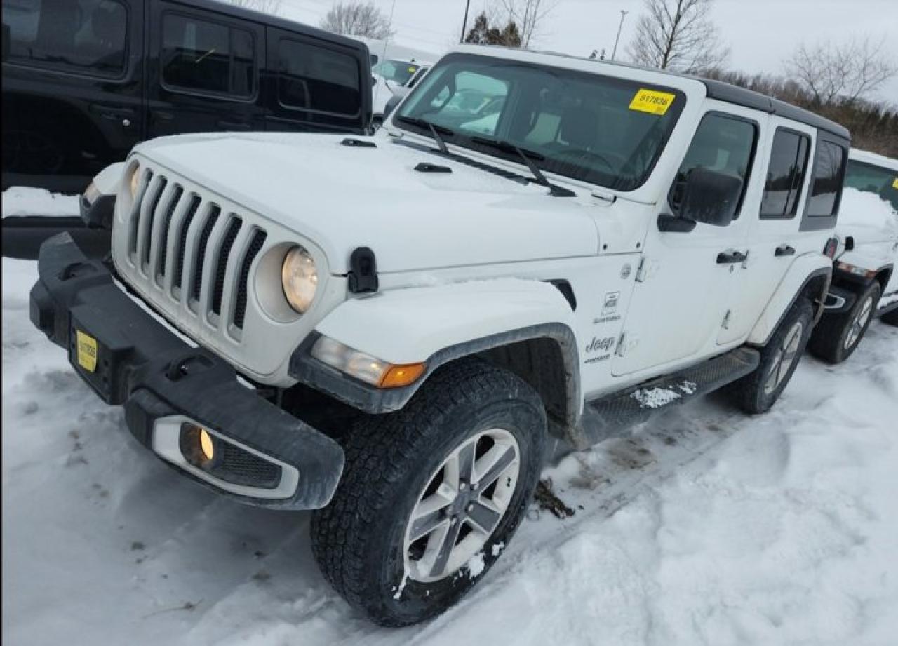 Come see this certified 2021 Jeep Wrangler Unlimited Sahara 4WD | 4-Dr | Leather | Nav | Heated Wheel + Seats | Remote Start | Rear Cam & More!. Its Automatic transmission and 2.0 L engine will keep you going. This Jeep Wrangler features the following options: Reverse Camera, Remote Start, Navigation System, Leather, Heated Steering Wheel, Air Conditioning, 4WD, Heated Seats, Tilt Steering Wheel, and Steering Radio Controls. Stop by and visit us at Mark Wilsons Better Used Cars, 5055 Whitelaw Road, Guelph, ON N1H 6J4.MASSIVE SELECTION: 500+ vehicles in ONE LOCATION, all Live Market Priced for the best value!STRAIGHTFORWARD & TRANSPARENT PRICING: Our Advertised Price INCLUDES:Safety Certification! (No separate certification fee upcharge).FREE Carfax History Report!NO upcharge for paying cash!CONFIDENCE & PEACE OF MIND: 30-Day/3,000 km Warranty INCLUDED! Plus a 5-Day Exchange Privilege!*EASY FINANCING: Better-than-bank rates, $0 Down, and 3 Months No Payments available OAC. BAD CREDIT APPROVED HERE!WE BUY CARS: Get Top Dollar for your trade, or sell us your vehicle for CASH even if you dont buy ours!www.shopwilsons.comAn Honest, Transparent Buying Experience. Trusted in business since 1961!(Cash Prices Exclude HST and Licensing Fees only.)