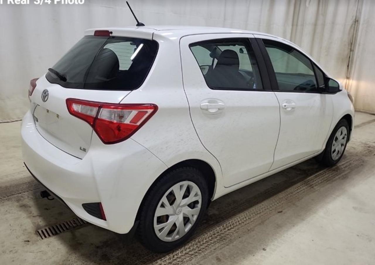 2019 Toyota Yaris Hatchback LE Manual | Fuel Saver | Reverse Camera | Bluetooth | AC | and Much More ! Photo