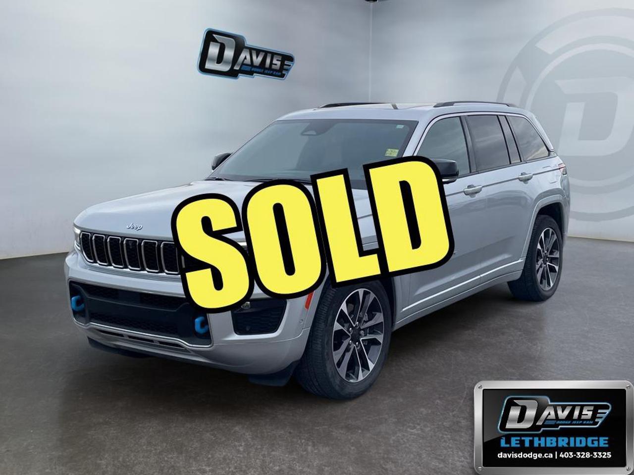 <b>Hybrid, Sunroof, Leather Seats, Cooled Seats, Tow Package!<br /> <br /></b><br /> The 2023 Jeep Grand Cherokee Overland 4xe is a premium plug-in hybrid SUV that combines legendary Jeep capability with advanced efficiency and luxury. Powered by a 2.0L turbocharged PHEV engine and electric motor, paired with an 8-speed automatic transmission, it delivers impressive performance with the added benefit of electric driving. Equipped with the Quadra-Trac II® 4x4 system, Quadra-Lift® air suspension, and Selec-Terrain® traction management, this Grand Cherokee is built to handle both rugged trails and refined daily driving.<br /><br />Finished in sophisticated Silver Zynith, the Overland trim stands out with 20-inch aluminum wheels, chrome exterior accents, a dual-pane panoramic sunroof, and a hands-free power liftgate. Inside, the cabin offers upscale comfort with Nappa leather seating, heated and ventilated front seats, heated second-row seats, and a heated steering wheel. Advanced features like multi-color ambient lighting, memory settings, and a quiet, acoustic-glass interior elevate every drive.<br /><br />Technology and safety are at the forefront with a 10.1-inch Uconnect® 5 NAV touchscreen, Apple CarPlay, Android Auto, wireless charging, and a premium 19-speaker audio system. Driver assistance features include Adaptive Cruise Control with Stop & Go, Active Lane Management, Blind Spot Monitoring, ParkSense front and rear park assist, and a surround view camera system. With its combination of hybrid efficiency, luxury, and off-road capability, this 2023 Grand Cherokee Overland 4xe is the perfect SUV for modern driving.<br /> <br />To apply right now for financing use this link: <a href=https://lethbridge.davisdodge.ca/free-credit-check/ target=_blank rel=nofollow noopener noreferrer>https://lethbridge.davisdodge.ca/free-credit-check/</a><br /> <br /><br />Locally Owned & Trusted for Over 35 Years  Davis Dodge in Lethbridge, AB <br /><br /> At Davis Dodge, weve proudly served the Lethbridge community for more than 35 years, offering an unparalleled car buying experience. Dont just take our word for itour Google reviews speak volumes about our commitment to exceptional service. <br /><br /> Delivery & At-Home Test Drives: Convenient options to suit your lifestyle. <br /><br /> Flexible Financing for Everyone: Get the vehicle you need with financing solutions tailored to your situation. <br /><br /> Full Mechanical Inspections & Professional Cleaning: Every vehicle is thoroughly inspected and cleaned before it hits our lot.<br /><br /> We take all makes and models on trade and offer competitive pricing with inventory that changes daily. Whether you're shopping for a Chrysler, Dodge, Jeep, RAM, or FIAT, our AMVIC Licensed dealership makes it easy to browse, buy, and drive away.<br /><br /> Located in Lethbridge, AB, we proudly serve customers in Fort Macleod, Taber, Claresholm, and Coaldale. Shop online or visit us today to experience the best in sales, service, and selection. Standard bank rates apply; taxes are additional.<br /><br /> Vehicle pricing offer shown expires 2026-06-30. <br /> Come by and check out our fleet of 60+ used cars and trucks and 100+ new cars and trucks for sale in Lethbridge. o~o