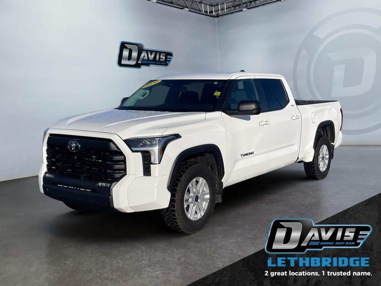 <b>Low Mileage, Heated Seats, Heated Steering Wheel, Navigation, Apple CarPlay, Android Auto!<br /> <br /></b><br /> The 2024 Toyota Tundra SR5 is a powerful and dependable full-size pickup built to handle both work and everyday driving with ease. Equipped with a robust 3.5L twin-turbo V6 engine paired to a smooth 10-speed automatic transmission, this Tundra delivers strong towing capability, impressive performance, and improved efficiency compared to traditional V8 trucks.<br /><br />Designed with durability and comfort in mind, the SR5 trim offers a bold exterior presence along with a practical and spacious interior. Inside, youll find modern conveniences like a user-friendly touchscreen infotainment system, smartphone connectivity with Apple CarPlay and Android Auto, and a comfortable cabin built for long drives or job site demands.<br /><br />Safety and reliability are key highlights, with advanced driver assistance features including Toyota Safety Sense, adaptive cruise control, lane departure alert, and a backup camera. Whether you need a capable work truck or a versatile daily driver, this 2024 Tundra SR5 delivers the performance, technology, and toughness truck buyers are looking for<br /> <br />To apply right now for financing use this link: <a href=https://lethbridge.davisdodge.ca/free-credit-check/ target=_blank rel=nofollow noopener noreferrer>https://lethbridge.davisdodge.ca/free-credit-check/</a><br /><br /> <br /><br />Locally Owned & Trusted for Over 35 Years  Davis Dodge in Lethbridge, AB <br /><br /> At Davis Dodge, weve proudly served the Lethbridge community for more than 35 years, offering an unparalleled car buying experience. Dont just take our word for itour Google reviews speak volumes about our commitment to exceptional service. <br /><br /> Delivery & At-Home Test Drives: Convenient options to suit your lifestyle. <br /><br /> Flexible Financing for Everyone: Get the vehicle you need with financing solutions tailored to your situation. <br /><br /> Full Mechanical Inspections & Professional Cleaning: Every vehicle is thoroughly inspected and cleaned before it hits our lot.<br /><br /> We take all makes and models on trade and offer competitive pricing with inventory that changes daily. Whether you're shopping for a Chrysler, Dodge, Jeep, RAM, or FIAT, our AMVIC Licensed dealership makes it easy to browse, buy, and drive away.<br /><br /> Located in Lethbridge, AB, we proudly serve customers in Fort Macleod, Taber, Claresholm, and Coaldale. Shop online or visit us today to experience the best in sales, service, and selection. Standard bank rates apply; taxes are additional.<br /><br /> Vehicle pricing offer shown expires 2026-04-30. <br /> Come by and check out our fleet of 70+ used cars and trucks and 110+ new cars and trucks for sale in Lethbridge. o~o