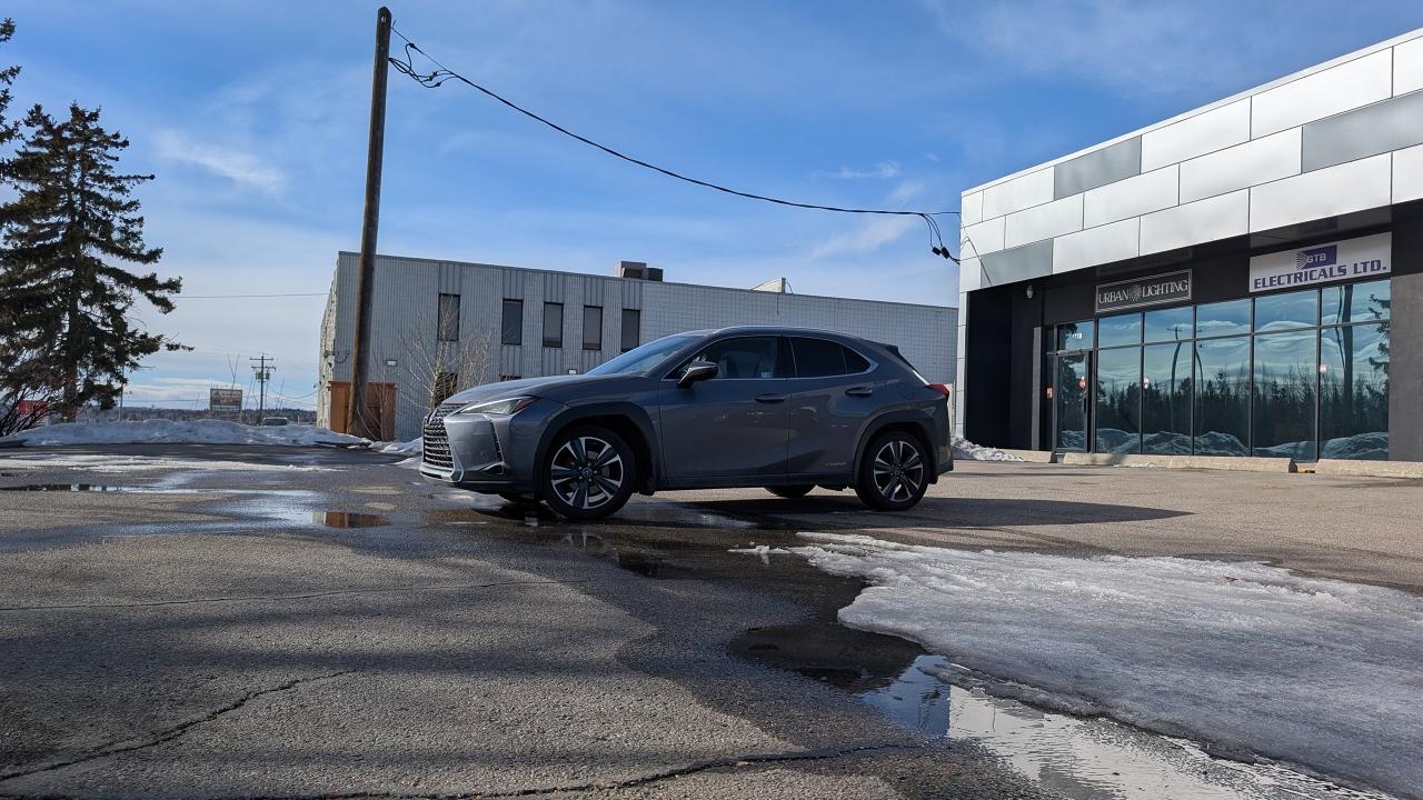 <p data-path-to-node=1><strong data-path-to-node=1 data-index-in-node=0>Just Arrived! 2021 Lexus UX 250h Luxury Package &ndash; AWD Hybrid</strong></p><p data-path-to-node=2>Exceptional fuel economy meets premium comfort. This just-arrived 2021 Lexus UX 250h is fully loaded with the Luxury Package and ready for the road.</p><p data-path-to-node=3><strong data-path-to-node=3 data-index-in-node=0>Vehicle Specs:</strong></p><ul data-path-to-node=4><li><p data-path-to-node=4,0,0><strong data-path-to-node=4,0,0 data-index-in-node=0>Price:</strong> $32,900</p></li><li><p data-path-to-node=4,1,0><strong data-path-to-node=4,1,0 data-index-in-node=0>Stock Number:</strong> JT043294</p></li><li><p data-path-to-node=4,2,0><strong data-path-to-node=4,2,0 data-index-in-node=0>Exterior:</strong> Gray</p></li><li><p data-path-to-node=4,3,0><strong data-path-to-node=4,3,0 data-index-in-node=0>Interior:</strong> Black</p></li><li><p id=p-rc_0912999800d84913-21 data-path-to-node=4,4,0><strong data-path-to-node=4,4,0 data-index-in-node=0><span class=citation-3>Drivetrain:</span></strong><span class=citation-3 citation-end-3> All-Wheel Drive (AWD) Hybrid<sup class=superscript data-turn-source-index=1><!----></sup></span></p><div class=source-inline-chip-container ng-star-inserted><button class=button ng-star-inserted aria-label=View source details for citation from Auto Trader. Opens side panel. data-hveid=0 data-ved=0CAAQvoAQahcKEwjC29CBkZGTAxUAAAAAHQAAAAAQPA><!----><!----></button><!----><!----><!----><!----></div><!----><!----><!----><!----><!----><!----><!----><!----><!----><p>&nbsp;</p></li></ul><p data-path-to-node=5><strong data-path-to-node=5 data-index-in-node=0>Standout Features:</strong></p><ul data-path-to-node=6><li><p data-path-to-node=6,0,0>Heated and Cooled (Ventilated) Front Seats</p></li><li><p data-path-to-node=6,1,0>Upgraded Luxury Package Interior</p></li><li><p data-path-to-node=6,2,0>Navigation & Premium Display</p></li><li><p data-path-to-node=6,3,0>Power Sunroof</p></li><li><p data-path-to-node=6,4,0>Apple CarPlay & Android Auto</p></li><li><p id=p-rc_0912999800d84913-22 data-path-to-node=6,5,0><span class=citation-2 citation-end-2>Lexus Safety System+ 2.0 (Blind Spot Monitoring, Adaptive Cruise Control, and more)<sup class=superscript data-turn-source-index=2><!----></sup></span></p><div class=source-inline-chip-container ng-star-inserted><button class=button ng-star-inserted aria-label=View source details for citation from Auto Trader. Opens side panel. data-hveid=0 data-ved=0CAAQvoAQahcKEwjC29CBkZGTAxUAAAAAHQAAAAAQPQ><!----><!----></button><!----><!----><!----><!----></div><!----><!----><!----><!----><!----><!----><!----><!----><!----><p>&nbsp;</p></li><li><p data-path-to-node=6,6,0>Incredible Hybrid Fuel Efficiency (Approx. 6.0L/100km combined)</p></li></ul><hr data-path-to-node=7><p data-path-to-node=8><strong data-path-to-node=8 data-index-in-node=0>Fagan Family Automotive</strong> <em data-path-to-node=8 data-index-in-node=24>Andrew, Owner</em></p><p data-path-to-node=9>📍 By Appointment Only AMVIC Licensed Dealer All prices are plus GST and costs & charges associated with financing Warranty included | Extended warranty options available</p>