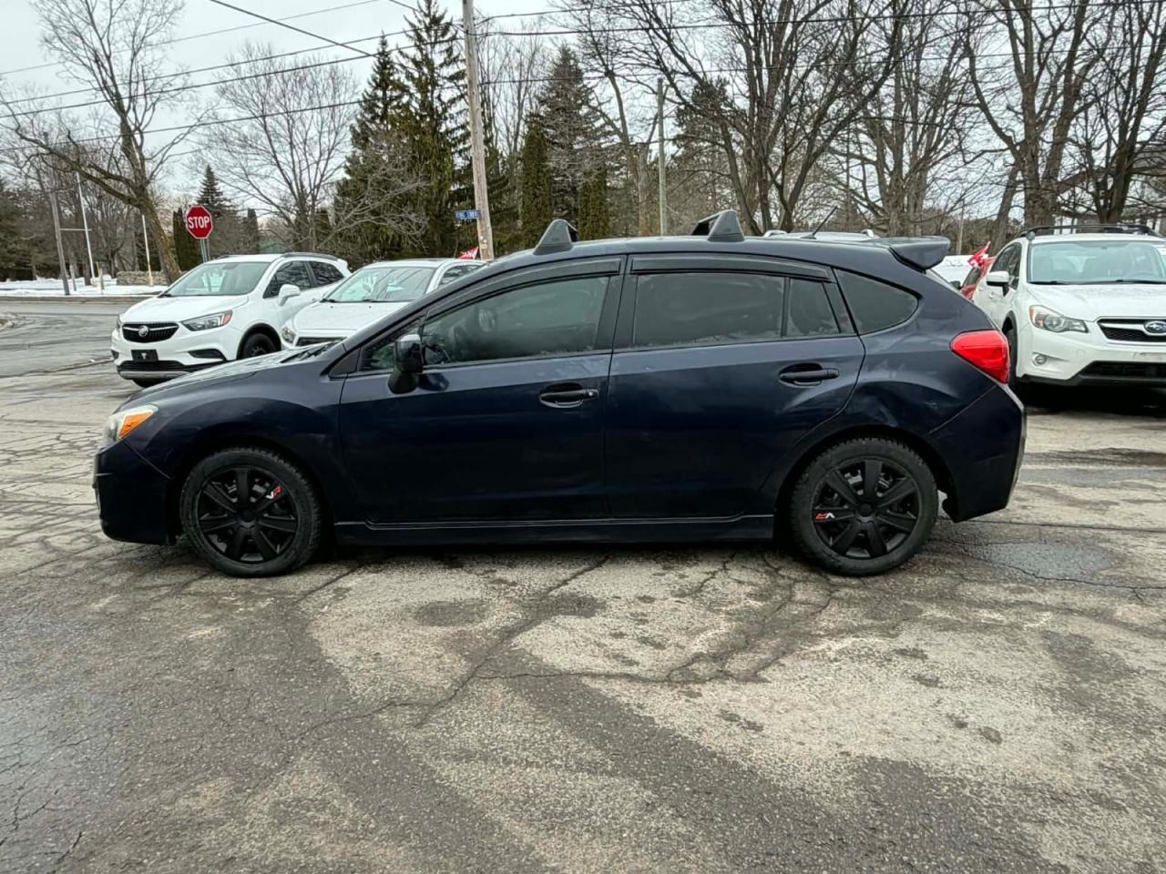 2014 Subaru Impreza 5dr Auto 2.0i Premium Photo
