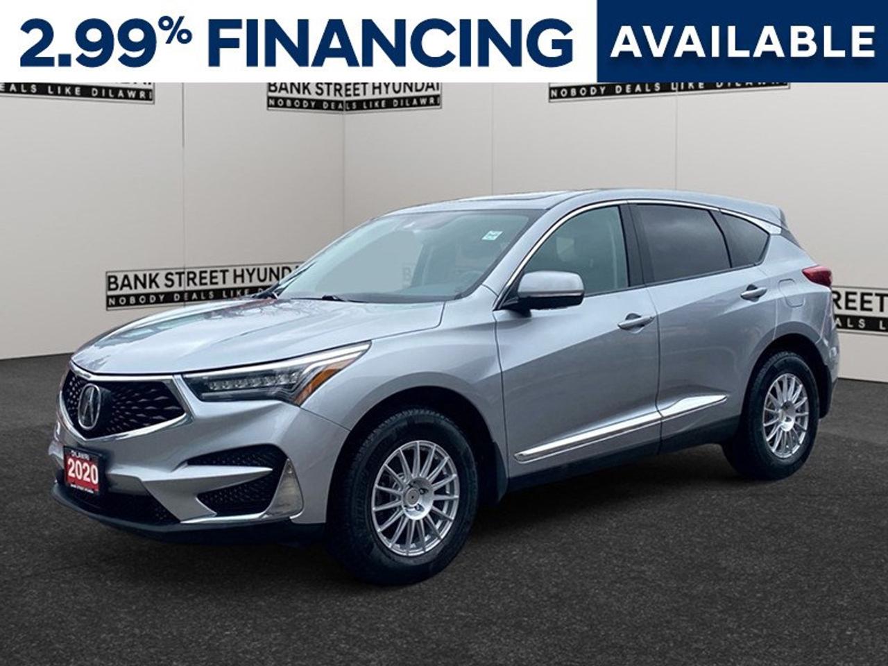 Presenting the impressive 2020 Acura RDX Tech AWD in a sophisticated Silver finish, offering impeccable all-wheel drive performance for those who demand both elegance and capability. This automatic SUV showcases a commanding presence on the road, ensuring you handle every terrain with confidence. The RDXs striking exterior is complemented by its sleek design and functional features like alloy wheels and a sunroof/moonroof, perfectly blending style with practicality. Inside, the vehicle is equipped with luxurious heated power seats, providing unparalleled comfort for every journey. Utilize the spacious cabin and smart device integration to enhance your driving experience, while the hint of blue from the ambient lighting ensures a modern touch to the interior atmosphere. Loaded with advanced technology, the 2020 Acura RDX spares no expense in keeping you connected and safe. Stay entertained through the satellite radio feature and discover endless possibilities with the wi-fi hotspot. Safety is paramount with features such as a backup camera, lane assist, and brake assist, allowing you to navigate every drive with peace of mind. This SUV is perfect for individuals or families who value technology, luxury, and reliability in their adventures. Ready to make a statement on the roads? Contact our dealership today to learn more about the available options and schedule a test drive with this standout vehicle.