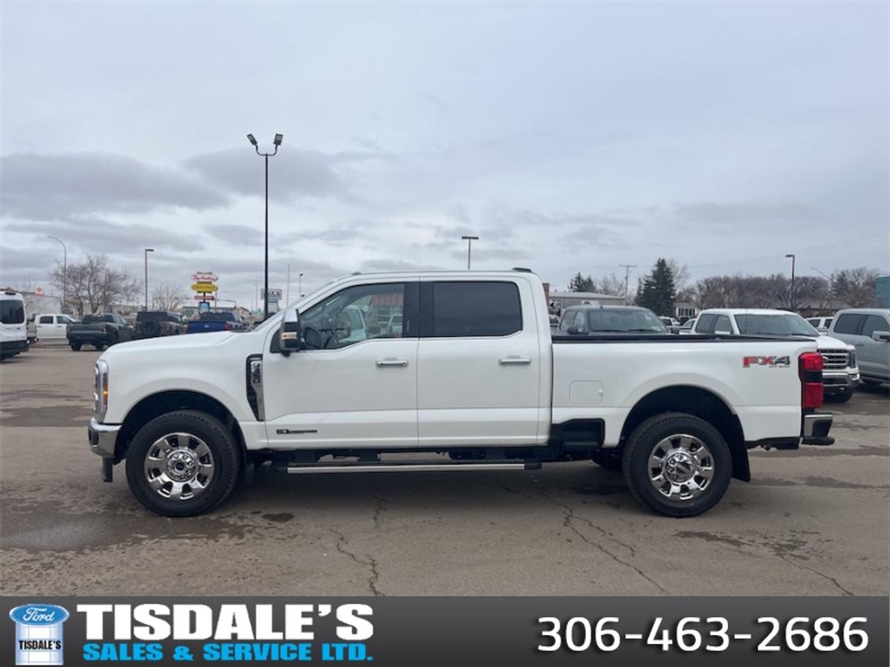 <b>FX4 Off-Road Package, Spray-in Bedliner, Running Boards, Tailgate Step and Handle!</b><br> <br> Check out the large selection of new Fords at Tisdales today!<br> <br>This Ford Super Duty is the toughest, most capable pickup truck that Ford has ever built, and thats saying a lot.<br> <br>The most capable truck for work or play, this heavy-duty Ford F-350 never stops moving forward and gives you the power you need, the features you want, and the style you crave! With high-strength, military-grade aluminum construction, this F-350 Super Duty cuts the weight without sacrificing toughness. The interior design is first class, with simple to read text, easy to push buttons and plenty of outward visibility. This truck is strong, extremely comfortable and ready for anything.<br> <br>This Star White Tri-Coat sought after diesel Crew Cab 4X4 pickup has an Automatic transmission and is powered by a 475HP 6.7L 8 Cylinder Engine. <br> <br> Our F-350 Super Dutys trim level is Lariat. Experience rugged capability and luxury in this F-350 Lariat trim, which features leather-trimmed heated and ventilated front seats with power adjustment, memory function and lumbar support, a heated leather-wrapped steering wheel, voice-activated dual-zone automatic climate control, power-adjustable pedals, a sonorous 8-speaker Bang & Olufsen audio system, and two 120-volt AC power outlets. This truck is also ready to get busy, with equipment such as class V towing equipment with a hitch, trailer wiring harness, a brake controller and trailer sway control, beefy suspension with heavy duty shock absorbers, power extendable trailer style mirrors, and LED headlights with front fog lamps and automatic high beams. Connectivity is handled by a 12-inch infotainment screen powered by SYNC 4, bundled with Apple CarPlay, Android Auto, inbuilt navigation, and SiriusXM satellite radio. Safety features also include a surround camera system, pre-collision assist with automatic emergency braking and cross-traffic alert, blind spot detection, rear parking sensors, forward collision mitigation, and a cargo bed camera. This vehicle has been upgraded with the following features: FX4 Off-Road Package, Spray-in Bedliner, Running Boards, Tailgate Step and Handle.<br><br> View the original window sticker for this vehicle with this url <b><a href=http://www.windowsticker.forddirect.com/windowsticker.pdf?vin=1FT8W3BT1TEE02885 target=_blank>http://www.windowsticker.forddirect.com/windowsticker.pdf?vin=1FT8W3BT1TEE02885</a></b>.<br> <br>To apply right now for financing use this link: <a href=http://www.tisdales.com/shopping-tools/apply-for-credit.html target=_blank>http://www.tisdales.com/shopping-tools/apply-for-credit.html</a><br> <br/>5.49% financing for 84 months. <br> Buy this vehicle now for the lowest bi-weekly payment of <b>$792.64</b> with $0 down for 84 months @ 5.49% APR O.A.C. ( Plus applicable taxes - $699 administration fee included in sale price. ). Incentives expire 2026-08-31. See dealer for details. <br><br>Tisdales is not your standard dealership. Sales consultants are available to discuss what vehicle would best suit the customer and their lifestyle, and if a certain vehicle isnt readily available on the lot, one will be brought in.<br> Come by and check out our fleet of 20+ used cars and trucks and 80+ new cars and trucks for sale in Kindersley.  o~o