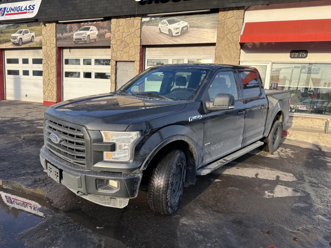 2015 Ford F-150 4WD SUPERCREW 145" LARIAT Photo