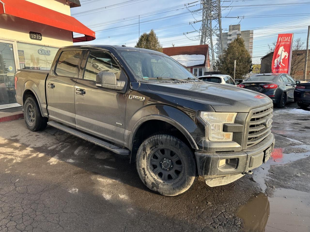 2015 Ford F-150 4WD SUPERCREW 145" LARIAT Photo