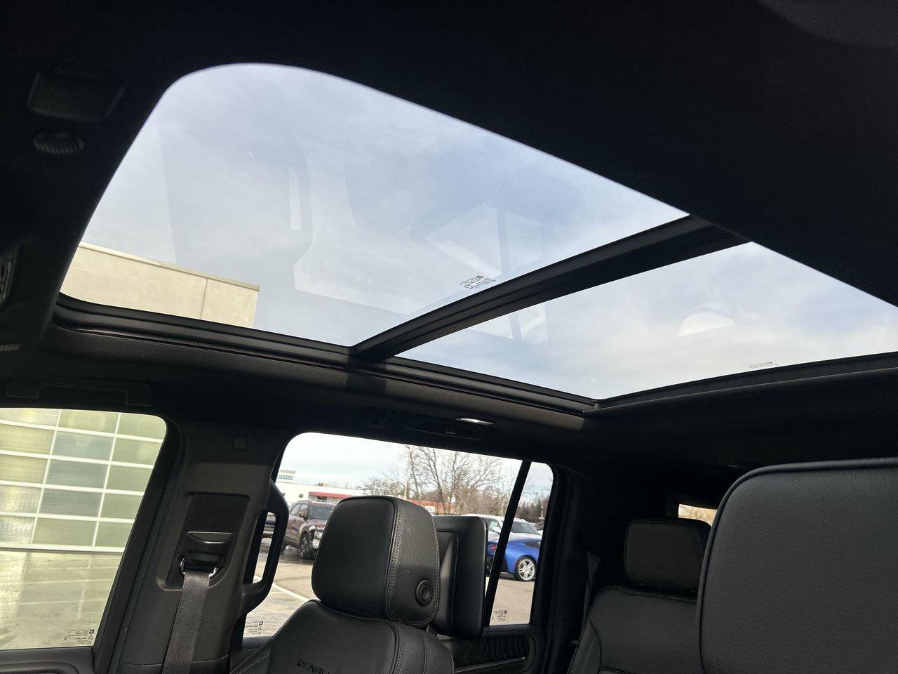 2021 GMC Yukon XL Denali Denali Reserve Rear Screens Power Running B Photo