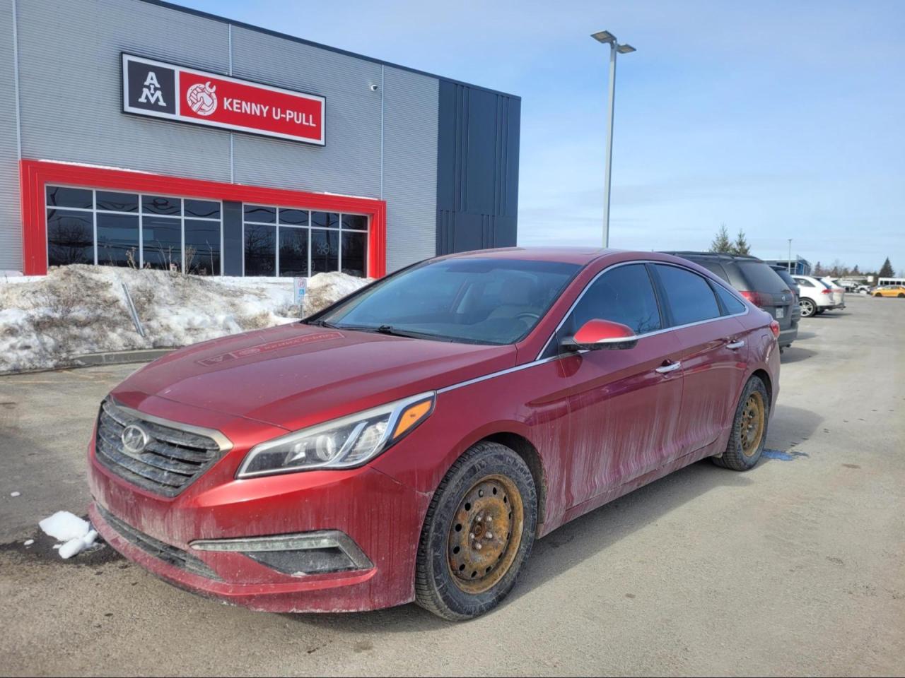 2015 Hyundai Sonata in Red. The vehicle has 198,312km. The vehicle runs and drives decent. The body is in decent shape for the age. The engine is knocking. Check engine light is on. We dont perform any mechanical/safety inspections. The vehicle is sold as is and might need some work.
