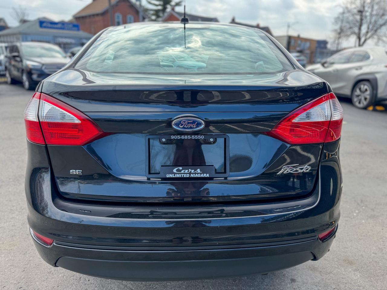 2014 Ford Fiesta SE/LOW KM/BLUETOOTH/HEATED SEATS/FUEL EFFICIENT Photo