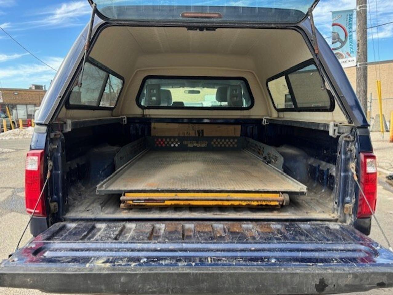 2012 Ford F-250 4WD SUPER CAB-SHORT BOX-CAP-CARGO SLIDE-CERTIFIED Photo