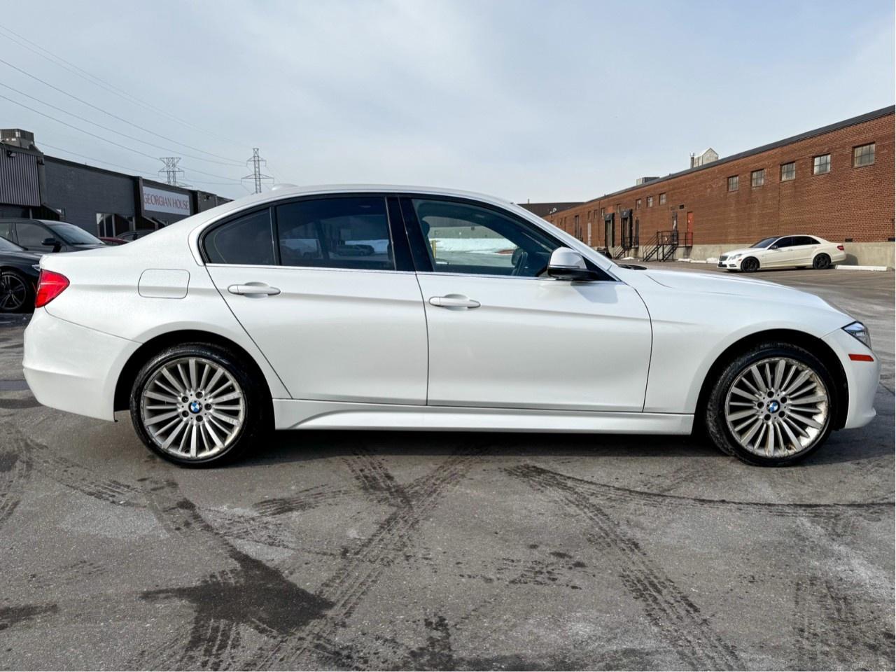 2015 BMW 3 Series 4dr Sdn 328i xDrive AWD Photo