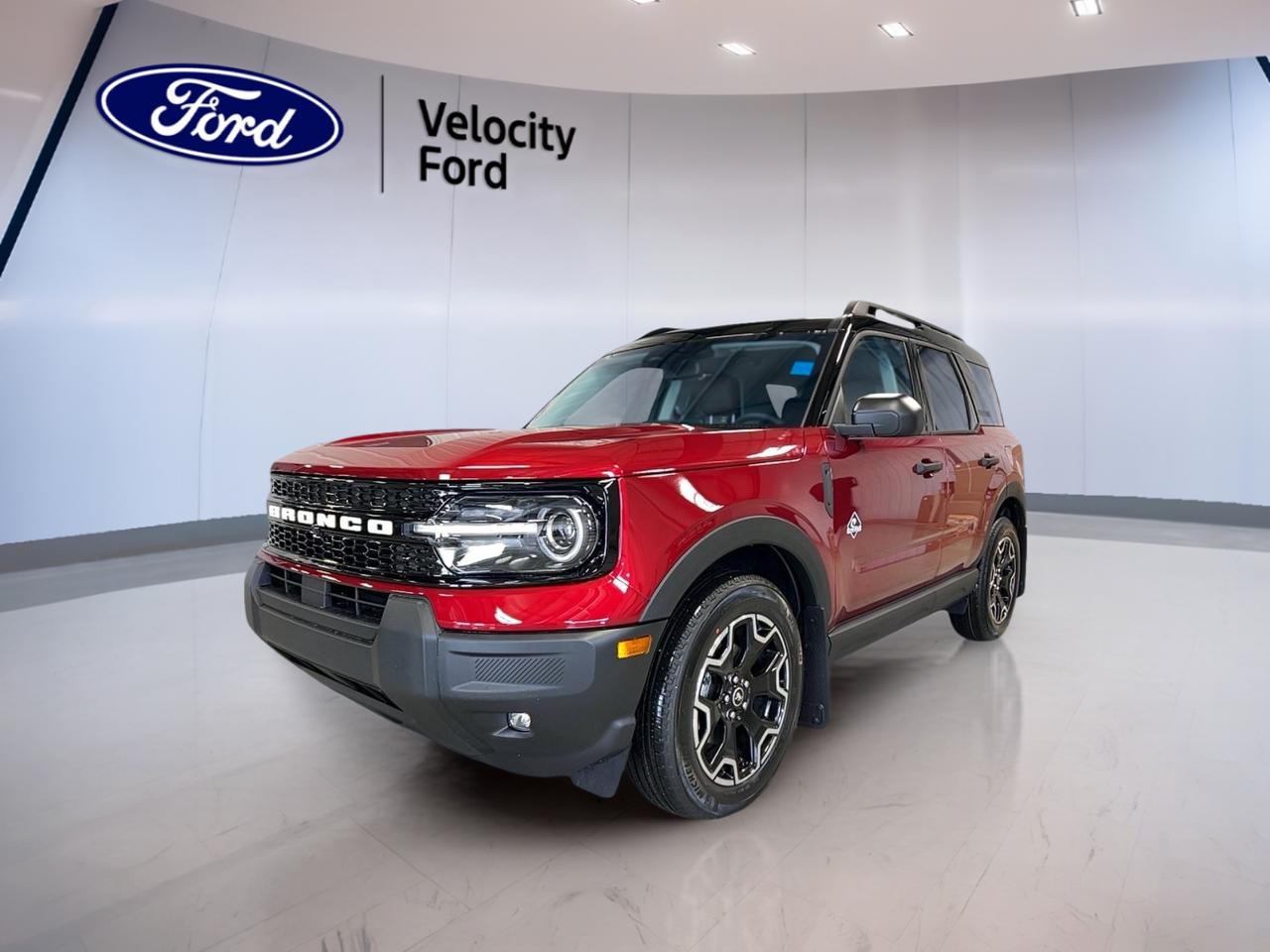 Meet the new 2026 Ford Bronco Sport Outer Banks 4x4 at Velocity Ford in Moose Jaw. This brand new SUV blends everyday comfort with true Ford utility. Its red exterior and black interior give it a clean, confident look, while four doors and automatic transmission make daily use easy.

Powered by a 1.5-litre unleaded engine, the 2026 Ford Bronco Sport Outer Banks 4x4 delivers smooth response and practical efficiency for work, errands, and weekend travel. Four-wheel drive adds year-round confidence, which is a real benefit for Saskatchewan roads and changing weather.

FEATURES OF THE Bronco Sport Outer Banks 4x4

»» Red exterior with black interior  
»» Four doors for easy passenger access  
»» Automatic transmission for smooth daily driving  
»» Four-wheel drive for added traction  

ADVANCED SAFETY FEATURES

»» Anti-lock braking system helps maintain control  
»» Stability control supports confident road handling  
»» Backup camera assists while reversing  
»» Blind spot monitor adds lane awareness  

The 2026 Ford Bronco Sport Outer Banks 4x4 is equipped with key driver-assist and protection features that help support peace of mind. Lane departure warning, driver and passenger airbags, side impact airbags, head side airbags, child safety locks, and tire pressure monitoring all add useful everyday confidence.

PERFORMANCE AND EFFICIENCY

»» 1.5-litre unleaded engine balances power efficiently  
»» Eight-speed automatic supports smooth acceleration  
»» Four-wheel drive improves traction in weather  
»» Power steering helps easy low-speed manoeuvres  

This 2026 Ford Bronco Sport Outer Banks 4x4 is built to feel composed in city traffic and capable on rougher roads. The automatic transmission works well with the turbocharged engine layout commonly used in this model line, helping provide responsive performance for daily driving needs.

COMFORT AND CONVENIENCE

»» Heated front seats add cold-weather comfort  
»» Dual-zone climate control helps all occupants  
»» Remote starter warms cabin before entry  
»» Power windows add everyday ease  

Inside, the 2026 Ford Bronco Sport Outer Banks 4x4 offers comfort-focused features that make each trip more enjoyable. You also get front air conditioning, automatic climate control, an adjustable steering wheel, driver lumbar support, memory seats, rear trunk access, tinted windows, and automatic door locks.

TECHNONOLGY AND CONNECTIVITY

»» Bluetooth integration supports hands-free phone use  
»» WiFi hotspot keeps devices better connected  
»» Satellite radio expands entertainment choices  
»» Steering wheel audio controls add convenience  

The 2026 Ford Bronco Sport Outer Banks 4x4 also includes push button start, automatic headlights, LED headlamps, an auto-dimming rearview mirror, illuminated driver and passenger vanity mirrors, and ambient lighting package details that help create a more refined cabin experience.

CARGO SPACE

»» Rear trunk access makes loading simple  
»» Four-door layout supports daily family use  
»» Flexible cabin suits errands and travel  
»» Useful storage room for active lifestyles  

The 2026 Ford Bronco Sport Outer Banks 4x4 is well suited for shopping, commuting, and weekend gear. Its SUV design gives you practical cargo versatility, and the rear area is easy to access when loading groceries, bags, or everyday equipment.

WHAT OTHER OWNERS LIKE

»» Confident all-weather traction from four-wheel drive  
»» Easy-to-use infotainment and Bluetooth features  
»» Comfortable ride with useful seat heating  
»» Practical cargo room for daily life  

This 2026 Ford Bronco Sport Outer Banks 4x4s VIN is: 3FMCR9CN7TRE18053.